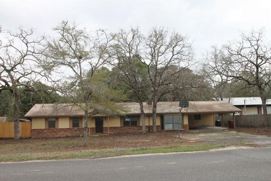 Real Estate Owned property located in growing North Crestview. This brick ranch style home offers 4 bedrooms and 3 full bathrooms and is situated on approximately 1/2 acre. The layout includes spacious living areas, a kitchen with ample cabinetry, and generously sized bedrooms. The primary bedroom features two oversized walk in closets and an additional secure interior space. Exterior features include an in ground pool and a fenced backyard with privacy fencing designed to allow airflow. Property offers country style living with no city taxes. Convenient location with easy access to shopping, schools, and major roadways. Call to take a look at 6047 Eden Square today.