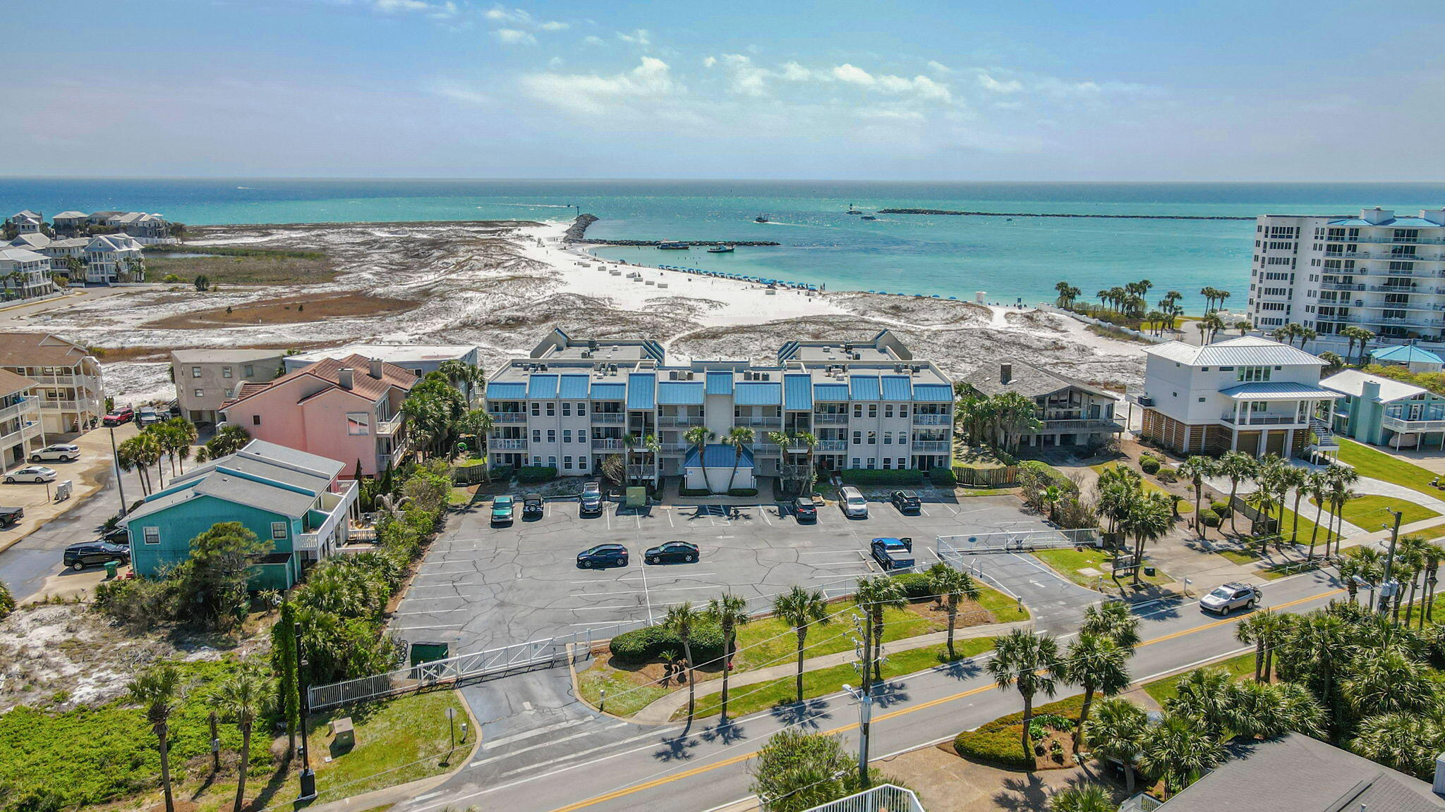 Location, location, location!! This is a 2 bed, 2 bath, 1st floor, end unit with access to the pool and a private path to the beach. 2 unassigned parking spaces are included. This would make a great investment property or vacation home. Tile floors throughout with LVP flooring in the 2nd bedroom. Granite countertops, tile backsplash and stainless appliances in the kitchen. There is a water taxi that can take you to Harborwalk village, with great dining options and shopping just minutes away. A new water heater was installed in January 2024.