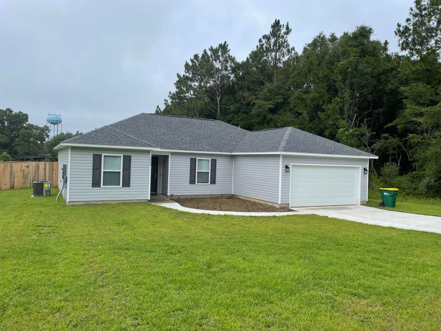 Available for move in Oct 10th! Practically brand new 4 bedroom/2bath home with large privacy fenced back yard. Well appointed kitchen with stainless steel appliances, granite counter tops, & solid wood cabinetry. LVP throughout, no carpet! Great floor plan with split bedroom layout, spacious guest bath, master bath with dual sink vanity, soaker tub as well as separate shower, & walk-in closet.