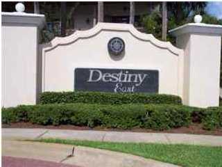 Price just lowered - owner says sell! Rare beautiful lot overlooking the lake with Gulf views. Enjoy our famous sunsets from the large waterfront lot. This is one of the few remaining lots Destiny East offers 2 pools, tennis courts, a large playground hot tub, workout facility a theater is available in the club house which can be used to host large special events. Build your dream home close to the beach in this private gated community.