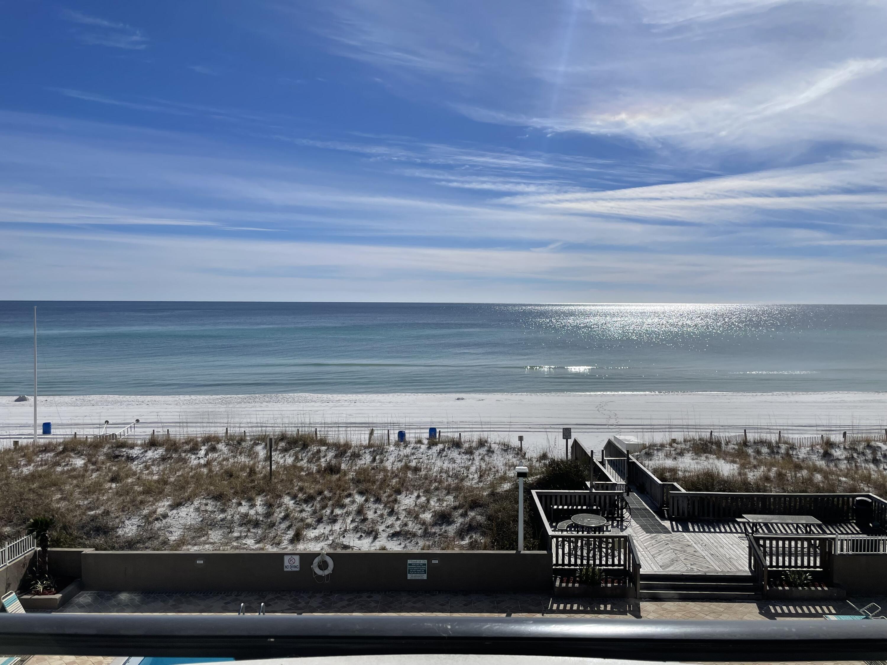 Now on the market! 2/2 Fully Furnished Condo with Unforgettable Gulf Views in Fort Walton Beach. Wake up to the endless emerald expanse of the Gulf of Mexico from this stunning 2/2 condo on Okaloosa Island! Recently updated with beautiful durable flooring, sparkling stainless steel appliances, and sleek countertops, this beach retreat offers the perfect blend of modern comfort and coastal charm. Step onto your private balcony and be captivated by the breathtaking, unobstructed panorama of the Gulf Coast. Watch dolphins frolic in the waves and sugar-white sand glisten under the sun. This condo boasts one of the best views on the island, with no buildings or obstructions blocking your views of the waves. A great rental or your own private retreat, make your appointment today!