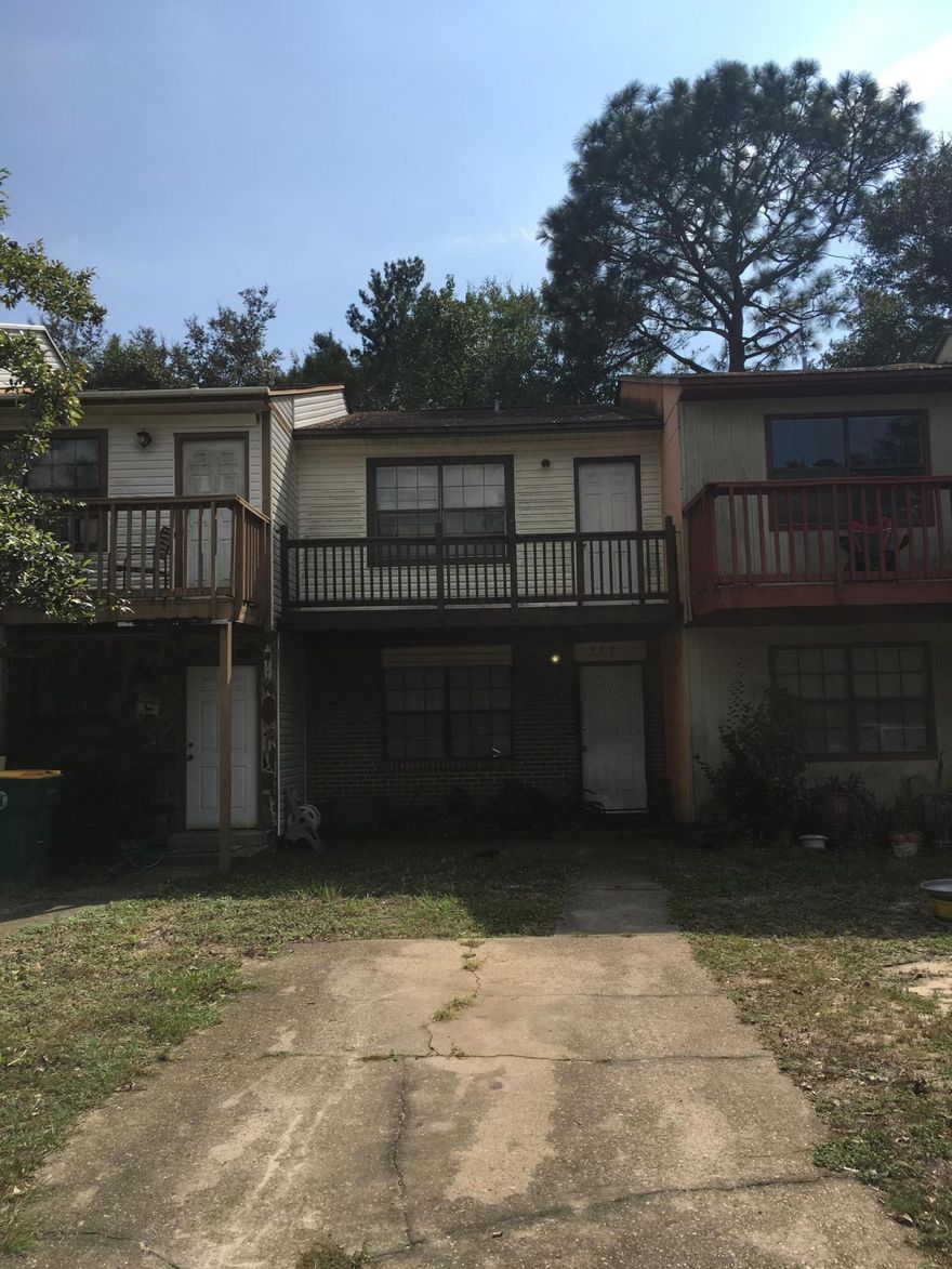 NEW PICTURES*** GREAT INVESTMENT OPPORTUNITY OR FIRST HOME! FRESH INTERIOR PAINT THROUGHOUT! Centrally Located 2 Bedroom 2.5 Bath Townhouse in the Heart of Fort Walton Beach. Very Convenient to Eglin AFB and Hurlburt Field! Near Schools and Shopping. Great Layout with Bedrooms Upstairs. Each has it's Own Bathroom -one Bathroom even has a Double Vanity. The Front Bedroom has Access to the Balcony. Half Bath is on the First Floor. Spacious Living Room. Kitchen Area has Room for a Dining Table. Sliding Glass Door leads to a Utility Room with Washer/Dryer Hook-ups. Fenced Backyard. No HOA! Great for a First-Time Homeowner, Someone Looking to Downsize, Or an Investor looking for a Great Rental Unit. Don't Miss Out on this Opportunity.Buyer to verify measurements. NEW PHOTOS COMING SOON!