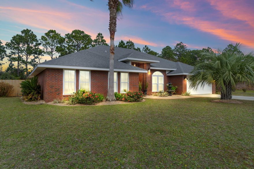 Beautiful 4 bedroom 3 bathroom brick home in Marion Manor with no HOA and just under 3000 sq ft!  Stunning tile throughout as you enter the home to an open floor plan with vaulted ceilings. Spacious family room and formal dining room leading into the kitchen of your dreams!  Custom wood soft-close cabinets, granite countertops, kitchen island with prep sink, double ovens, built in microwave, refrigerator with ice & water dispenser, cooktop with stainless hood range.  Pantry with wine cooler and additional ice maker. Laundry room has more custom cabinets and a folding counter. The primary bedroom has a trey ceiling, hardwood floors and primary bathroom retreat with two walk in closets, separate shower, a soaker tub and a SAUNA! French doors open to the backyard oasis with