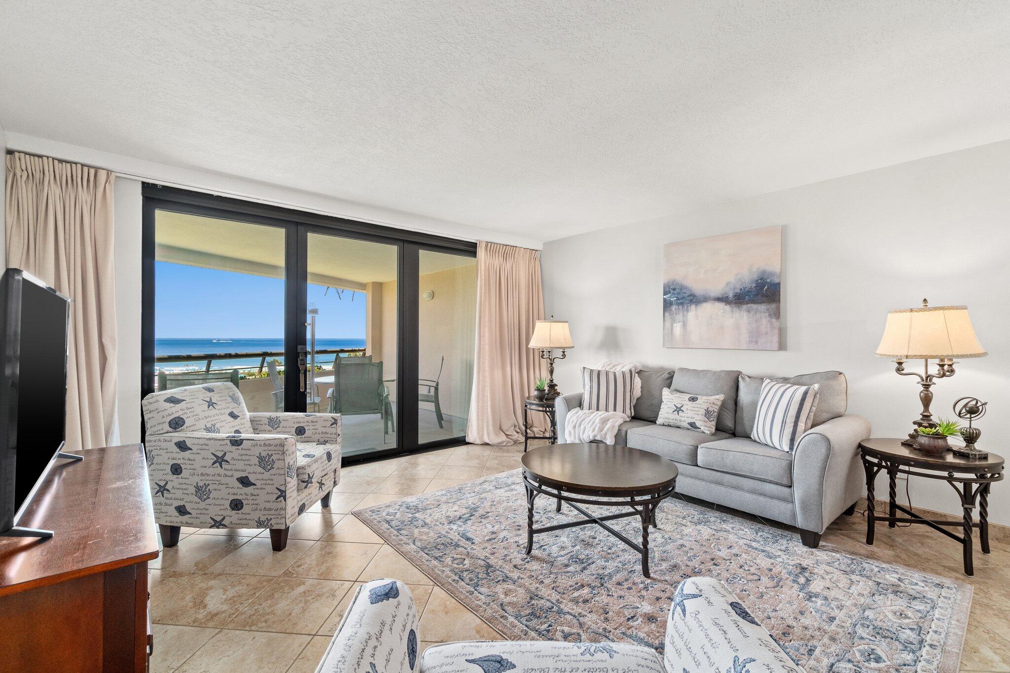 Prepare to be enchanted! The breathtaking view and white sand beaches of the Gulf of Mexico will delight you to no end when you add in the gorgeous landscaped gardens of this FULLY furnished condo. This waterfront condo sleeps 4 and has great rental income. Recent upgrades that give the unit a classy coastal beach feel. Amenities include covered parking (uncovered 'tall vehicle' parking), two pools, spa, fitness center, game room, putting green, shuffleboard and basketball court. In unit washer and dryer along with updated appliances, extra cabinets in the kitchen with a private owners closet just outside. 2021 - $47,417.64