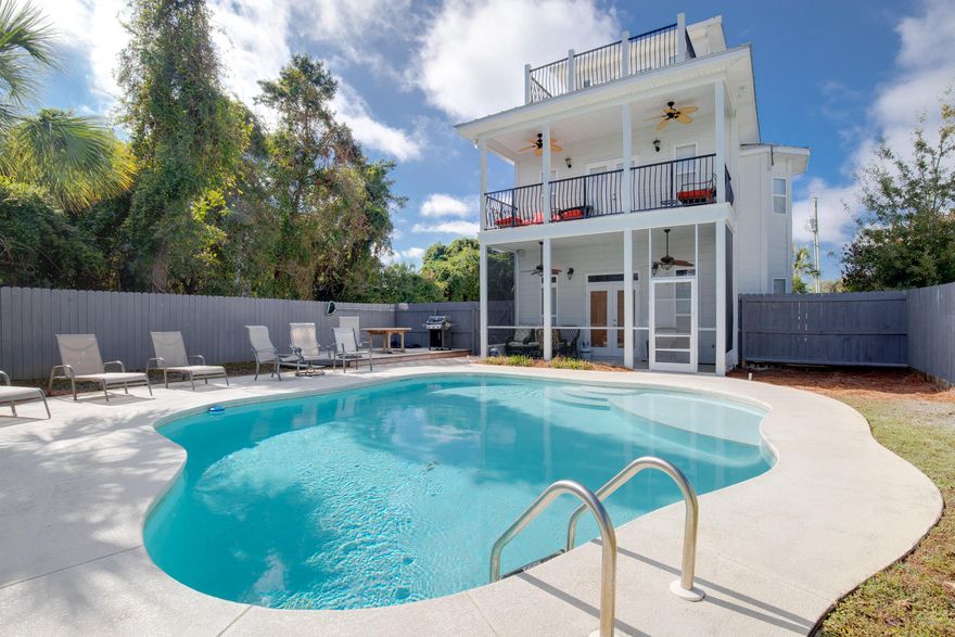 Interior lighting and decor updates as well as the entire exterior has been freshly painted. This home is located in the charming community of Crystal beach with white picket fences, a bike path and walking distance to a 5 star spa & restaurants. The large 50 x 150 lot allows for a main house, carriage house and one of the largest private pools within a courtyard. The main house is comprised of a first floor bedroom suite, a second floor master with private balcony overlooking the courtyard, a bunk room suite and a bonus tower room. The separate guest cottage offers 2 rooms, a kitchenette and private bathroom. This home is sold furnished and turnkey with management in place.