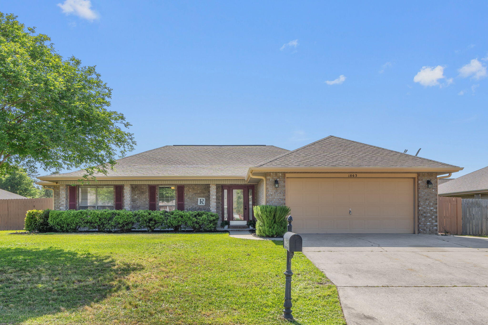 Welcome to your Bay Side retreat in the heart of Santa Rosa County! This 4 bed 2 bath home sits on a corner lot in a tucked away community. As you step inside, you're greeted by a bright living area with smooth vaulted ceilings overhead. New luxury vinyl plank flooring flows throughout, complemented by fresh paint, recessed lighting, and updated lighting fixtures in each room. The kitchen offers generous granite countertop space and an open layout. Four spacious bedrooms provide plenty of room for family, guests, or a home office. Outside, a widened driveway allows for additional parking. The sizable yard features a sprinkler system for for easy lawn maintenance, and an 8x16 workshop/shed-complete with power. This home is walking distance to the Bay and it's wonderful paved walking path.