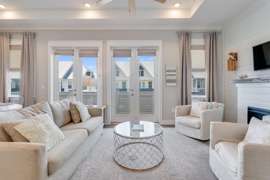 A 'C' unit with a FIREPLACE! Welcome to 23 E York Lane, a remarkable opportunity in the sought-after resort community of Prominence. This 1,182 square foot unit offers a blend of comfort and convenience, making it an ideal choice for both personal use and investment. The residence features two spacious bedrooms and two well-appointed bathrooms, designed with hardwood flooring and tile throughout and accented with stylish shiplap details.The open-concept living area is enhanced by a cozy fireplace, creating a warm and inviting atmosphere. This home is rental ready and turnkey, providing a seamless transition for new owners. Included with the property is a golf cart, offering easy access to the vibrant surroundings. Prominence is renowned for its exceptional amenities, including a stunning 5,000 square foot heated pool on the North side, and a second pool located south of 30A. Residents can enjoy the grill and patio area, as well as several green spaces for relaxation and recreation. The property is strategically positioned across the street from The Big Chill, offering a variety of dining, entertainment, and shopping options.

This home is perfectly situated in the middle of the East end of 30A, providing convenient access to the area's pristine beaches and attractions, as well as neighboring communities such as Seaside, Alys Beach, and Rosemary Beach. Whether you're seeking a permanent residence, a vacation getaway, or a lucrative investment opportunity, this property delivers on all fronts.

Don't miss the chance to own a piece of paradise in one of Florida's most desirable locations. Contact us today to schedule a viewing and experience the exceptional lifestyle that 23 E York Lane Unit C has to offer.