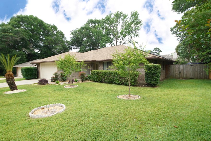 Central Niceville Location!  Three bedroom two bath home in Rocky Bayou with SOLAR PANELS.. Close to shopping, schools, parks, and Eglin AFB. Spacious living area has custom media center  and is  open to dining and Florida Room.  Kitchen includes stainless steel appliances, gas stove, granite countertops and plenty of cabinets. Home also features a large laundry room, two car garage, laminate flooring throughout and fenced yard. The backyard has mature fruit trees, raised beds and patio. Care of the fruit trees is included in rent. This is a NO PET  and NO SMOKING property. Owners average electricity bill is $30! Tenants are required to carry liability insurance.  Applications can be completed online at NicevilleRentals.com everyone over the age of 18 must apply.