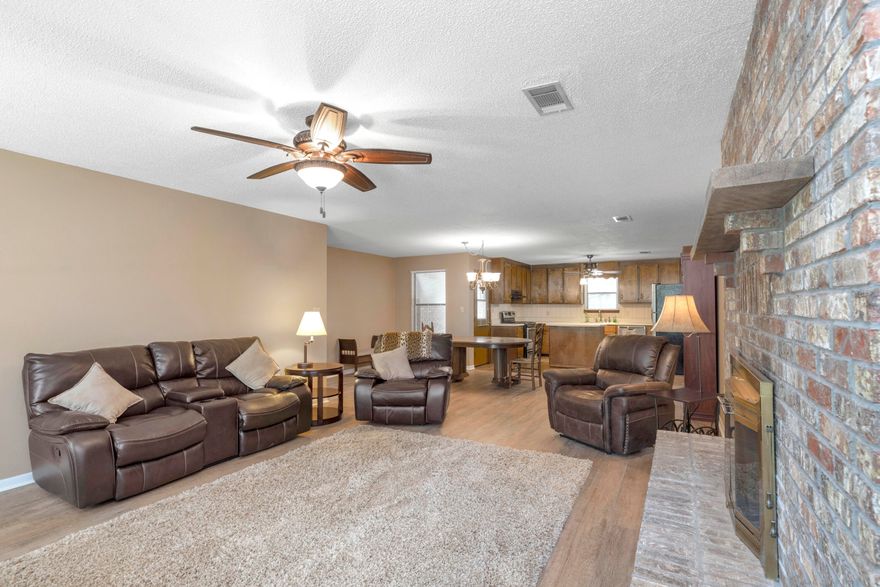 Seller is ready to move...Make an Offer!
You won't need to post on Crestview Word of Mouth about your electric bill because double insulation was added in the attic when it was built and double the number of trusses. All the carpet has been removed and replaced with either tile or LVP. The home is designed for entertaining with its spacious inside space and convenient access to the back porch from the kitchen. Outdoor entertaining will be stress free because guests have access to a restroom from the back porch.
If you love wildlife, you're sure to enjoy watching the deer and other wildlife play through the French doors of the primary suite or from the back porch.