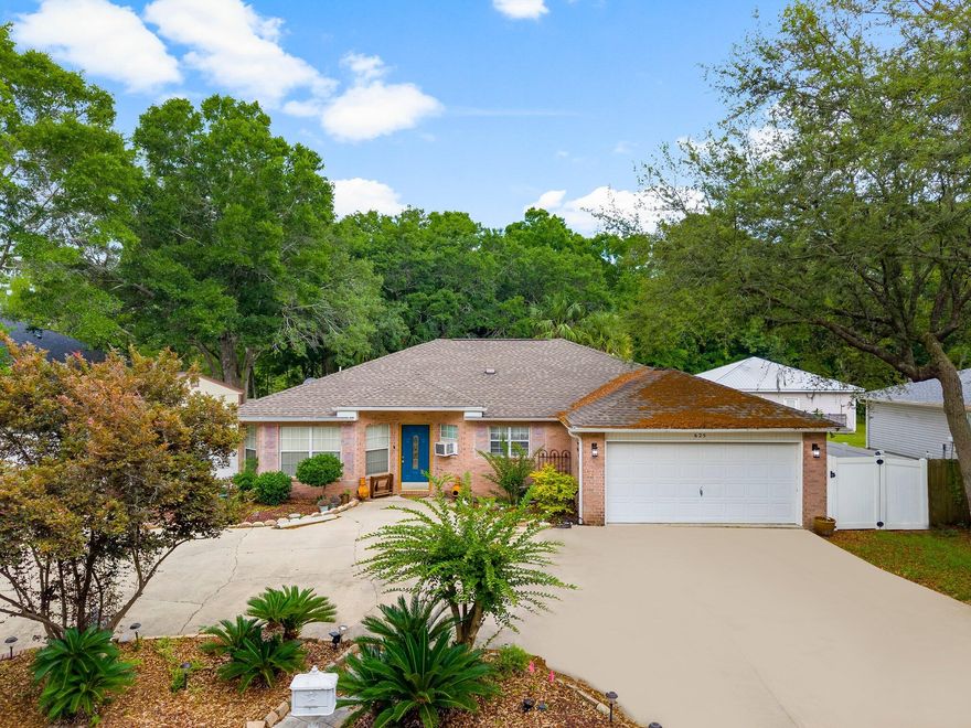 Investor Alert! Check out this home in the bayfront community of Waterview Cove. Situated on a half acre lot with low Walton County Taxes and NO HOA. Bring your boat and launch from the community boat launch! Unlock the potential of this single story brick home with a little TLC.Featuring a split bedroom floor plan. The spacious open-concept living area flows into large Florida room. The backyard is stunning with mature trees and foliage.Home is offered As-Is. Seller is MOTIVATED!