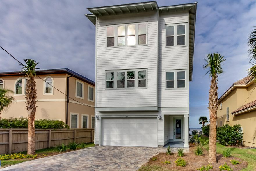 BOATER'S PARADISE. BAY FRONT HOME WITH BOAT LIFT AND DOCK! Gorgeous sunset views. Expansive views of Choctawhatchee Bay and the Destin Bridge. Beautiful new construction home with 50 ft. of waterfront and covered boat dock, and large back yard. This gorgeous 3 story home has an Elevator, and balconies off of each floor. There are two master suites, one on the first floor and the other on the third floor, with two guest bedrooms also on the third floor that share a hall bath. The kitchen, dining and living room are located on the second floor and offer a large open floor concept for entertaining large crowds. The back splash is a nice bright white subway tile. Gorgeous upgraded tile in the baths, including the laundry.