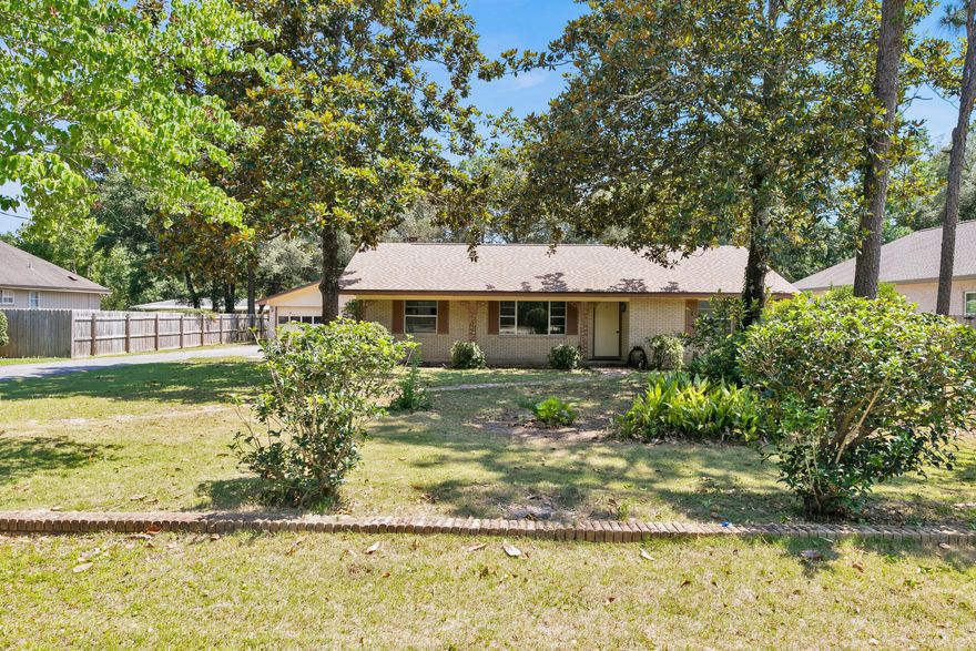 All brick POOL Home in Poquito Bayou! This home has been nicely updated to include wood look tile throughout common areas and guest rooms with a herringbone detail in kitchen and dining area. Brand new kitchen with stainless steel appliances, new cabinets, tiled backsplash, farmhouse sink and gorgeous granite countertops bathed in tons of light from the recently installed recessed lighting. Open floor plan and an additional bonus room with fireplace, FULL bathroom, spacious indoor laundry room and a screened-in porch. The entire home has a brand new ductless HVAC system with independent temperature controls. The home was completely rewired to include main line and new panel installed in 2020. Water heater 2022. Roof 2019. Gunite pool resurfaced in 2019 and a pool fence installed for added
