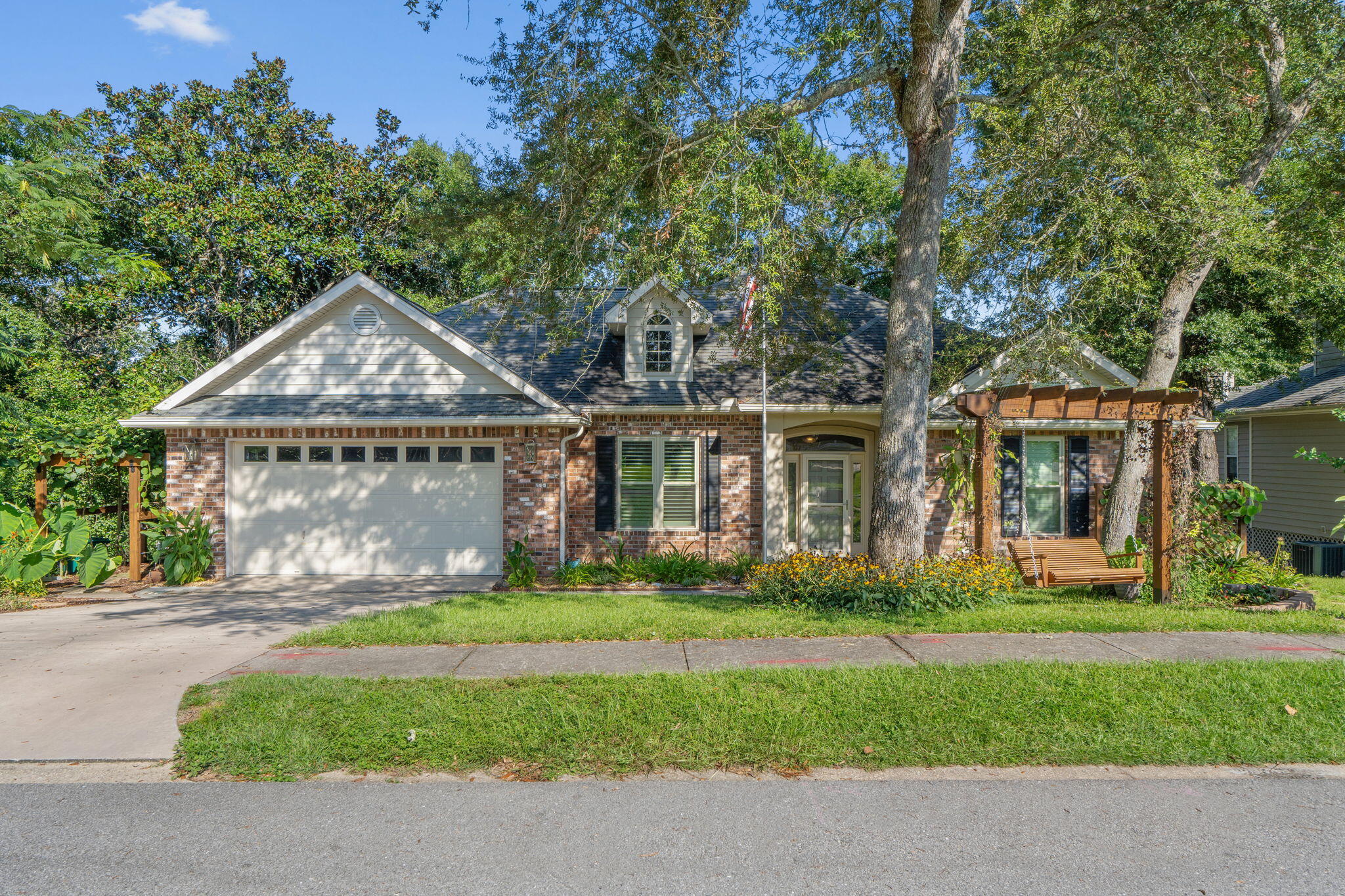 Discover this private creekside retreat in the heart of Niceville! Built by one of the area's top-rated builders, this home backs up to Beaver Creek with serene wooded views--perfect for birdwatching and wildlife lovers. The unique split-level layout offers a main-floor primary suite and 4 additional bedrooms downstairs, including a private mother-in-law suite with side entry and ensuite bath. Enjoy a 2020 kitchen remodel with solid wood cabinets, plus gas stove, dryer, and water heater. A new whole-house flow tankless water heater (2020), 6'' gutters, and over 6'' of attic insulation add comfort and energy efficiency. Multi-level decks and a peaceful sunroom provide ideal spaces to relax and entertain--all close to top-rated schools, golf, Eglin AFB, shopping, and dining + No HOA fees!