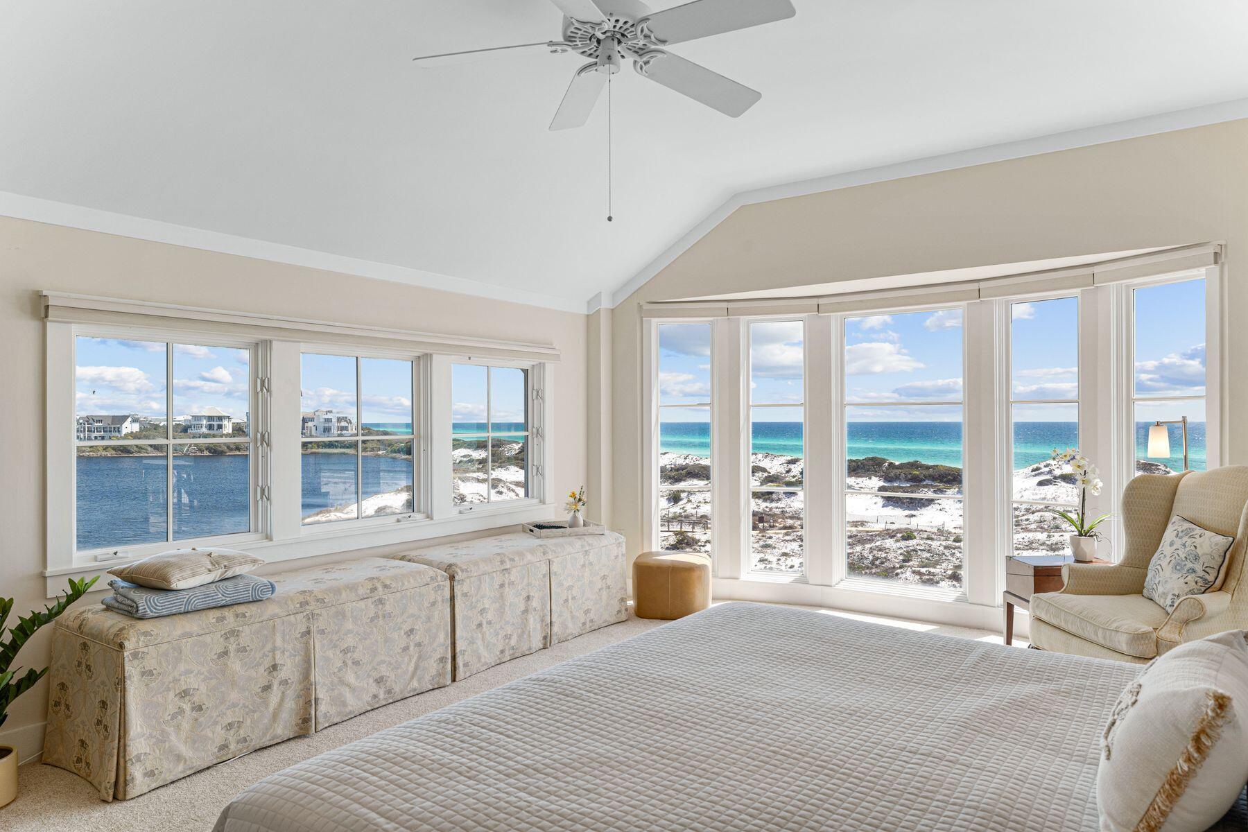 Under Contract with Kick out Clause. This rare top-floor end unit at The Crossings at WaterSound Beach is all about the views. Wake up in the primary suite, raise the remote-controlled electronic window treatments and take in stunning views of Camp Creek Lake and the Gulf of Mexico through two walls of windows including a magnificent floor-to-ceiling bay window. Views of the lake and shimmering Gulf of Mexico are equally breathtaking from the living room, kitchen, dining room and second bedroom. Wood flooring and feature windows enhance the stunning sitting room which shares the panoramic vista with the dining room and kitchen. The kitchen has a full range of wood cabinets, stainless steel appliances and granite countertops for smoothly preparing tasty snacks and gourmet meals.