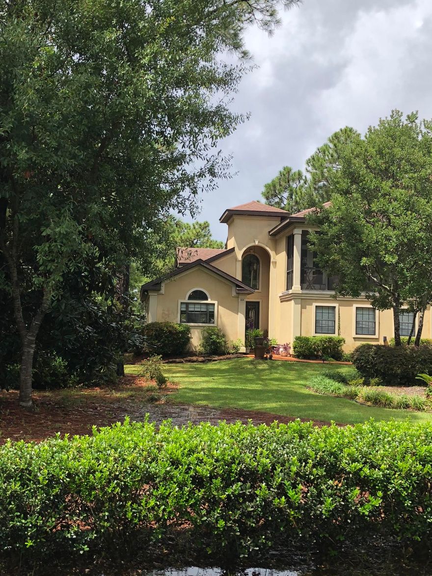 Stunning Custom two story home with Bay views, in the desirable neighborhood of Driftwood Estates. Park, Pickleball, basketball playground. three mile circle for walking, running and biking.10 minutes to Grand Blvd with great restaurants, Publix, shopping Hospital and shopping . Open staircase. Private and serene. Screened balcony and screened back veranda. Large private lot 100' x 250'. Second balcony off Master bed Castle iron front door. Two living areas with lots of windows and light. Fireplace mantle does not convey Not attached. 3 bedrooms 2 1/2 baths Hardwood floors, Til,e Riding lawnmower, Privacy fence Lush landscaping, Cabana and several venues for entertaining. Plenty of room for a pool. A very special home. Well maintained, Owner, seller is a licensed Florida Rea