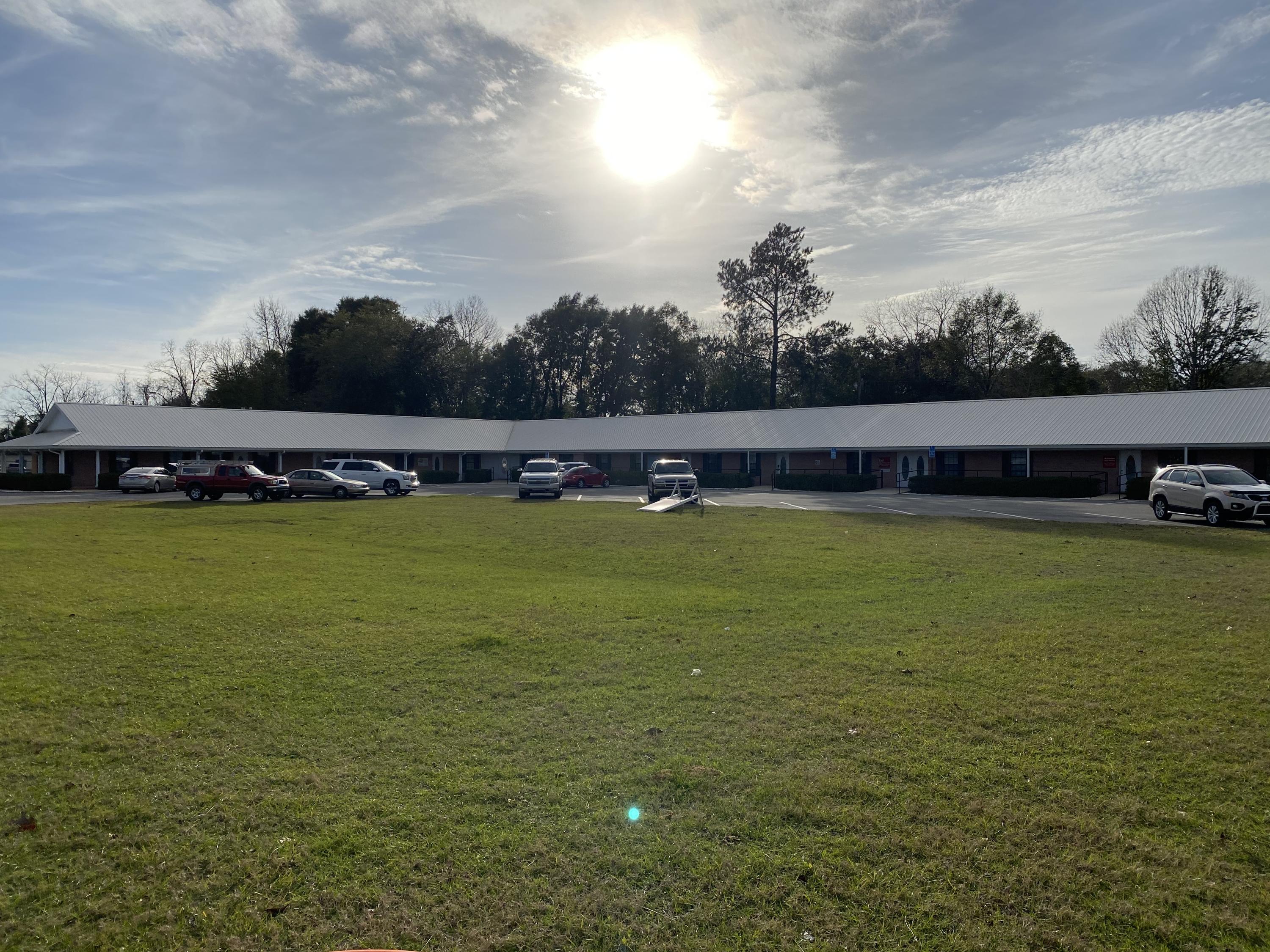 Great income producing investment property!One freestanding building located in Crestview.Most occupied. Eight suites leased by four tenants. One vacant.Nice corner building, at the intersection of Ferdon Blvd.(Hwy. 85 North) and Park Lane. Ample parking.Multi tenant, 12,100 sq ft commercial building,on 1.59 acres. Large monument sign for tenants.The total rent income for 2018 was $127,129.45.Five quality tenants with five year leases. Leases must be honored by buyer. The seller will consider owner financing. Allow 48 hours for showings.