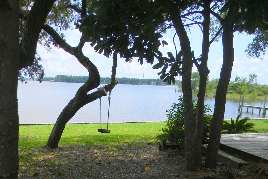 ELEVATION CERTIFICATE IS IN..ZONE X-NO FLOOD INSURANCE REQUIRED! 125 FEET ON THE WATER,& in the HEART OF NICEVILLE, this 3/2 &1/2 BRICK/wood HOME on ROCKY BAYOU will fulfill all your dreams. This HOME HAS LOTS OF ROOMS(possible 4th bed),LARGE YARD w chain link fence & WORKSHOP/(possible studio apartment?) There is a GREAT SWIMMING AREA & EXPENSIVE SEA WALL & PRIVATE DOCK, outdoor deck & screened porch for plenty of family & friends. The home has been recently updated with many new updates such as new carpet, new paint (inside and out), new flooring, new bathroom vanities& new ceiling fans.Per tax records home sq ft heated/cooled is 2344;however add the unheated&cooled workshop/(possible studio apartment?) with sink, shower,& toilet total sqft=3400. NO HOA FEES & TERMITE BOND.