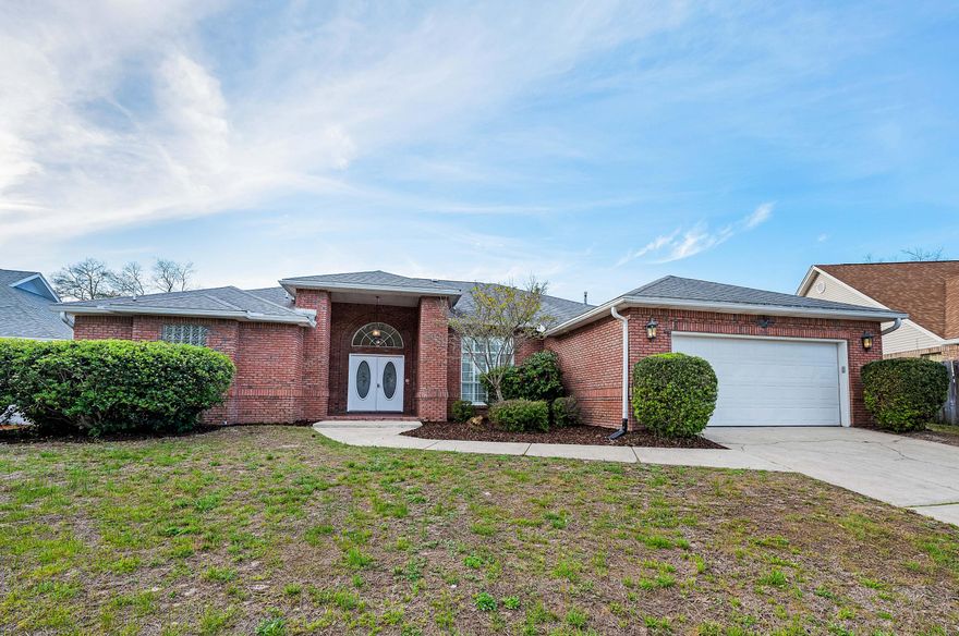 Buyers financing fell through back on the market. Stately columns support the covered entryway of your stately, all-brick 3 bed / 2 bath home.  Entering your new home, note the grandeur of the flat-panel wainscoting, crown molding, and chair rail in the common areas and formal dining room, accented with ornate trim on the doorways and supports.  To the right of the entryway is the formal dining room enhanced with large windows and plantation shutters. A short hall leads to the kitchen clad with dark granite countertops with natural white flecks that accent the white cabinetry.  A gas range (2021) and double basin sink complete the kitchen.  The granite continues on the large breakfast bar that overlooks the breakfast nook and living room, complete with gas fireplace,