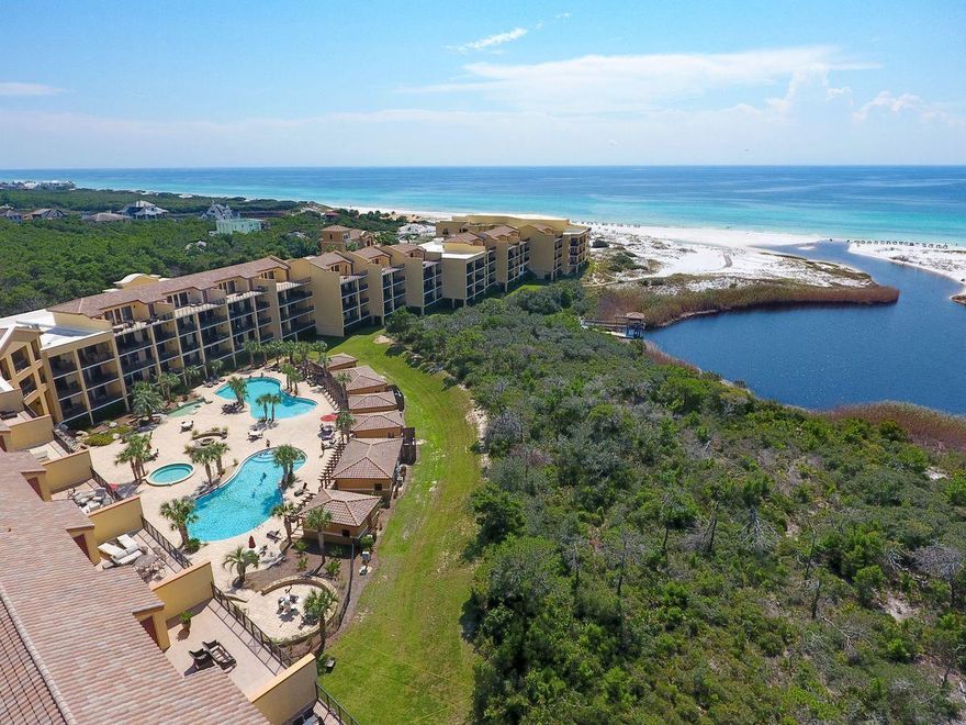 Overlooking the pristine vistas of Western Lake and the Gulf of Mexico, this two-story condominium is the pinnacle of luxury. In addition to having five bedrooms, five full baths, and an in-home theater/media room, this 4,511 sq/ft unit is replete with high end finishes and complemented by nearly 700 square feet of outdoor living space. The whole unit boasts travertine flooring and 10' ceiling height throughout. The open floor plan of the first level provides a spacious and versatile space for entertaining. The incredible kitchen comes with custom made cabinetry, stainless steel Viking appliances including a sizable gas range, and high end granite countertops. The first floor also offers two bedrooms with ensuite baths, a custom built-in wet bar, and an oversized balcony that sits at 27 feet in elevation to maximize the incredible sunset views this unit captures. The master suite is a masterpiece of elegance and occupies most of the second floor. It boasts a spacious private balcony with panoramic views, a whirlpool tub, and a spacious walk-in closet. Also on the second floor is the in-home theater which is a superb addition to the space and provides an extra level of comfort and relaxation. This property is being offered fully furnished and turn-key.

Sanctuary By The Sea is an exclusive gated community located on the West end of Scenic Highway 30A and it boasts incredible amenities including 650' of private beach frontage, 23 acres of privately owned land bordering a nature reserve, fitness facilities, three swimming pools with pool-side Cabanas, waterfalls, community fire pits, Viking BBQ grills, a Gulf-front owner's lounge, virtual golf simulator, and an arcade. Sanctuary By The Sea is centrally located near world class shopping, dining, and entertainment experiences in renowned locations such as Grayton Beach, Watercolor, and Seaside.
