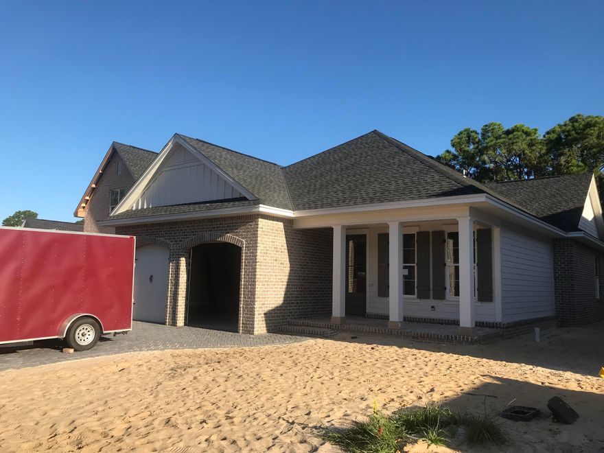 Brand new construction in picturesque Emerald Bay by local & top award winning builder Huff Homes of Florida. This expansive custom home is perfect for your family offering a large open floorplan, center kitchen island, quartz counter tops, crown molding, upgraded trim and 8' Classique raised panel interior doors, under mount sinks & a $4,850 appliance allowance just to name a few. Home will have 10ft ceilings through out the living, dining & kitchen! All bedrooms will offer 9ft ceilings. For added security, this home comes completely pre-wired for an alarm system, home theater and outside speakers. As with all Huff homes, this home boast quality & comfort. Buy today & customize your finishes making this home truly yours.