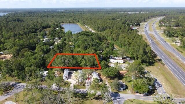 This .826-acre vacant land offers a prime location near the Choctawhatchee Bay and local Grady Brown Park. Plenty of room to build your dream home or retreat with space to spread out. Enjoy the quiet surroundings and convenient access to outdoor recreation. Buyers to verify any and all information deemed important to them.