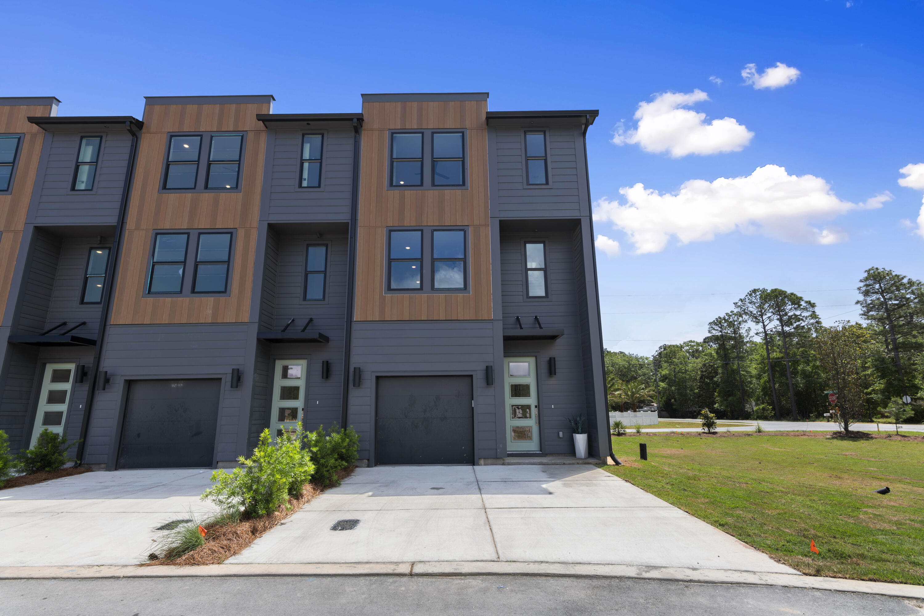 **Discover the perfect blend of luxury and convenience with these brand-new construction townhomes, ideally situated in the most sought-after section of the development. Offering **unmatched views and a premium location**, these homes provide a rare opportunity to enjoy the finest in modern design while being just steps away from the community's best amenities.  From **picturesque scenery** to **enhanced privacy and accessibility**, this prime setting ensures a superior living experience. Don't miss your chance to own a townhome in the **most desirable spot in the neighborhood! **Don't miss out on this over-the-moon opportunity to own a luxury townhome built with exceptional craftsmanship!' Based on loan type, the preferred lenders for this project are also offering 1% of the loan amount towards closing costs and/or a rate buy-down. 30North at Eden Park is Santa Rosa Beach's newest modern townhome neighborhood located just north of US Highway 98. The community features luxury 3-story, 4-bedroom townhomes with shopping, local restaurants, the beautiful beaches of 30A and Eden Gardens State Park just a short drive away, which boasts sprawling acres of mossy oak trees and alluring foliage to explore! The townhouse exterior exudes a chic fa??ade that complements the pristine natural surroundings and adds a touch of sophistication to the coastline.
The architect's vision has resulted in a harmonious blend of cutting-edge design and coastal allure, creating a captivating urban retreat close to all that 30A has to offer from shopping, dining, and the beautiful beaches of the Gulf of Mexico.
**Prices, plans, features, and options are subject to change without notice. Additional restrictions may apply. Sq. footage is approximate. Home information, including features and available options, are subject to change without notice. Artist renderings, photos, colors, features and sizes are for illustration purposes only and will vary from the homes as they are built. Elevations, exterior/interior colors, available upgrades, options, and standard features may vary and may include select options, elevations, and upgrades that require an additional charge.