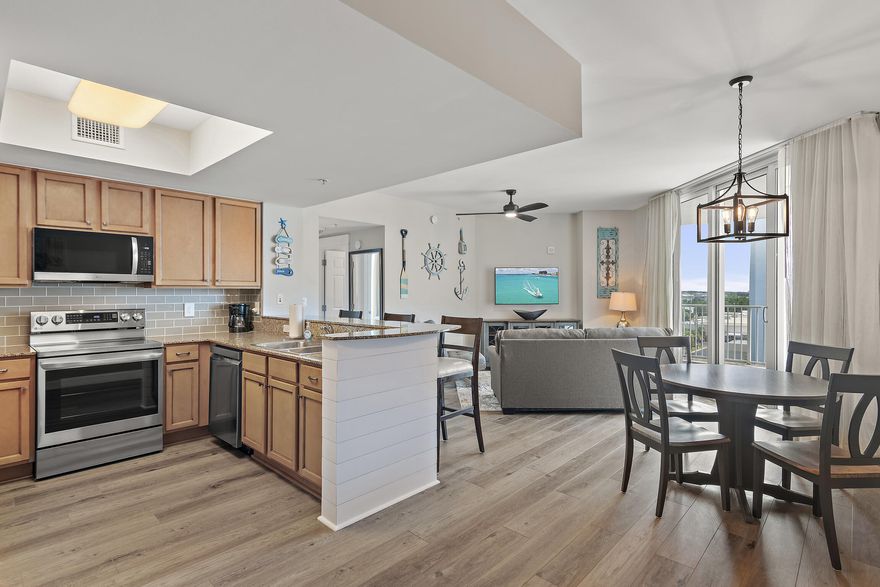 Seller to pay 1 year of HOA dues at closing! Don't miss out on this incredible opportunity to be the first to enjoy all the new features in this condo. From stainless appliances, and provenza flooring  to new furniture - almost everything in the condo is new except for nightstands and dressers! Breathtaking panoramic views of the Gulf of Mexico and the Destin skyline. Enjoy countless days on the patio watching boats in the Gulf or witnessing the stunning Destin sunsets.  The condo boasts two spacious bedrooms with NEW king beds and New Bedding - both offer balcony access, making it ideal for use as a second home, vacation rental, or primary residence. Located on the 7th floor, this fully furnished 2-bedroom unit offers a carefree beach lifestyle, with ALL utilities included in the HOA dues, including electricity. The resort amenities are impressive and include tropical landscaping, an 11,000 sq ft lagoon pool, a heated pool, a children's kiddie pool area and splash pad, tennis, pickleball, basketball, an onsite restaurant, a tiki bar, and a coffee shop, a fitness center, a covered parking area, ELECTRIC car charging station and security. Additionally, a free beach shuttle runs seasonally to take you across the street to the beach or to Harbor Walk for shopping and dining.

What are you waiting for?  Make this little gem yours today! 