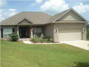 A choice location in a choice Neighborhood! Wonderful home on a cul-de-sac south of I-10 in Rolling Ridge subdivision. Home features nice open, split floor plan. Kitchen is complimented with ample, faux granite counter tops, good size pantry, breakfast bar, black appliances, smooth top stove and built in microwave. Great room with cathedral ceilings and 4 surround sound, in-ceiling speakers is open to the breakfast nook and kitchen with a door leading out to the deck. Relax and enjoy your morning coffee on the awesome deck. Master bedroom is complimented with crown molding and trayed ceilings. Master bath has faux granite counter tops, high vanity with double ceramic sinks, framed mirror, garden tub, separate shower, separate toliet room and 2 large walk-in closets. Square footage taken