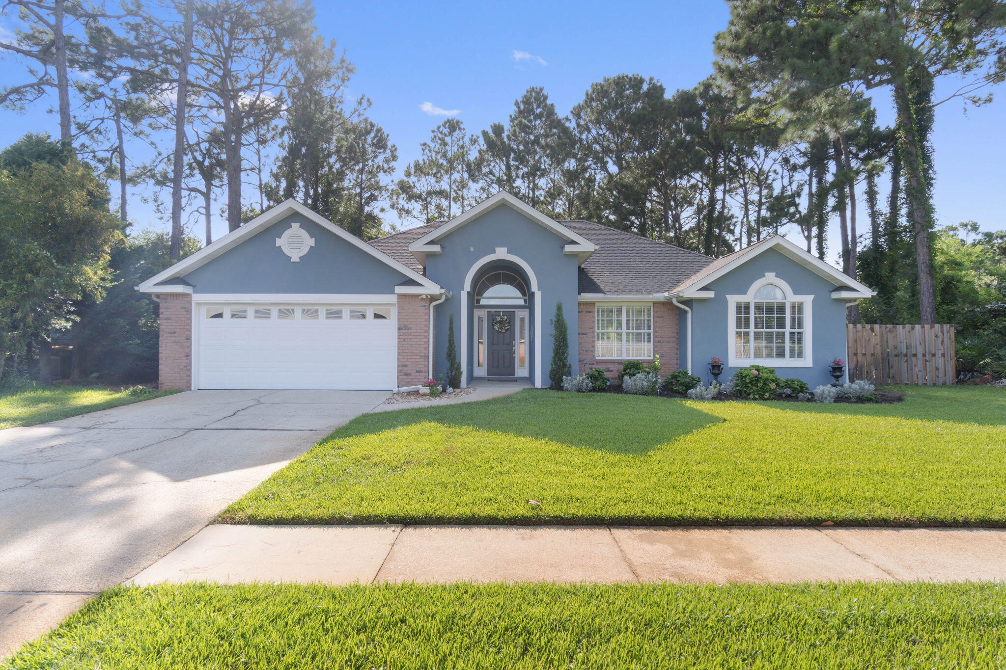 ** Welcome to your new home in the highly sought-after Eagles Landing community! This charming and meticulously maintained 3-bed, 2-bath home has numerous upgrades and is meticulously maintained. Exclusive Community: Eagles Landing is a small, close-knit community of only 49 homes, ensuring a serene and friendly atmosphere. Enjoy the perks of a private pool and gazebo, just steps from your front door - perfect for relaxation or entertaining. This is a well-maintained brick and stucco exterior, with a beautifully manicured lawn and surrounding trees that provide both privacy and a stunning backdrop. Fenced-In Parking Area: Ideal for parking your boat, RV, etc. The home has ceramic tile flooring with wood that is inviting and easy to maintain.