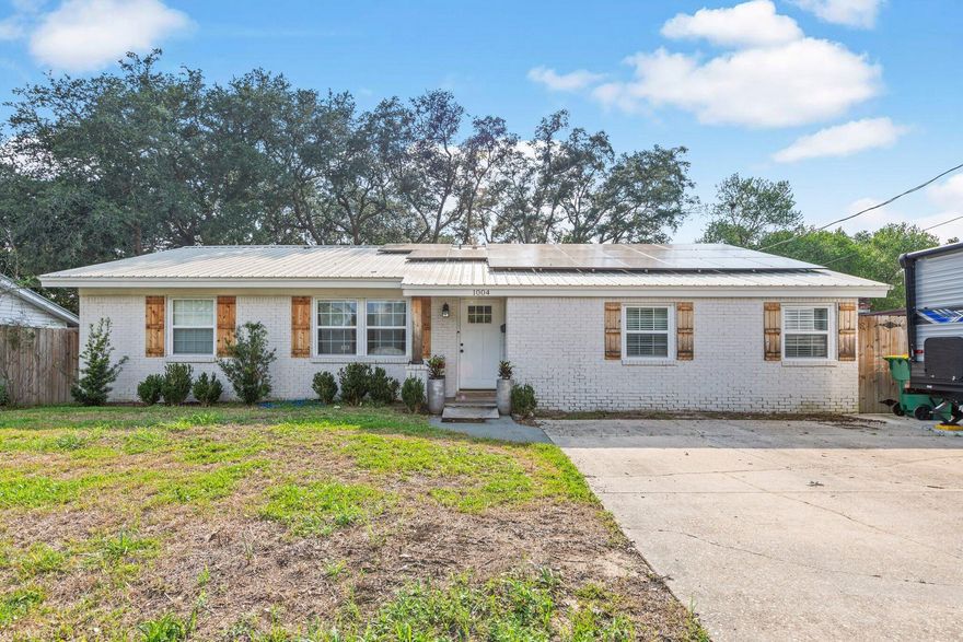 Updates galore in this beautiful 3 bedroom, 3 bath home that is move-in ready! Lots of cabinets and stainless appliances adorn the kitchen/dining area with plenty of space for a large dining table. French doors lead to an open patio and fully fenced backyard. The master bedroom has a custom walk- in closet and adjoining master bath with double vanities, soaking tub and separate shower. Popular LVP flooring throughout the main living areas and carpet in the bedrooms. Electrical, light fixtures, plumbing, windows and roof have also been replaced the last few years. This is a wonderful location convenient to all the amenities Niceville has to offer. Call for your showing today!!