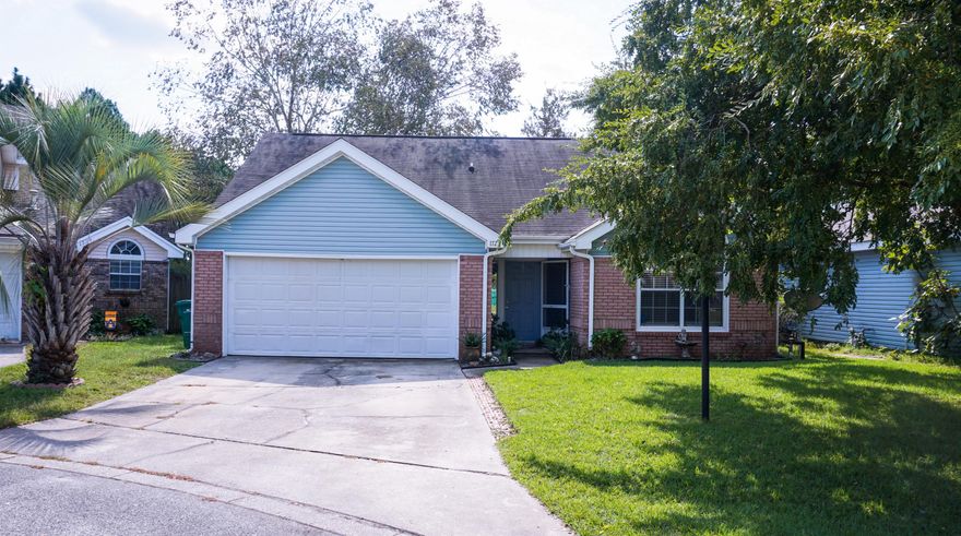 One of the best views of Lake Charleston includes vaulted ceilings and French doors in the great room overlooking the lake, a tiled fireplace, a 10x30 wood deck, ceiling fans in every room, and trey ceilings in the master bedroom. Small, fenced yard is landscaped and easy to maintain. This home has cable outlets in every room including the kitchen, a roomy attic for storage, two full baths and an indoor laundry room. Convenient to both bases.