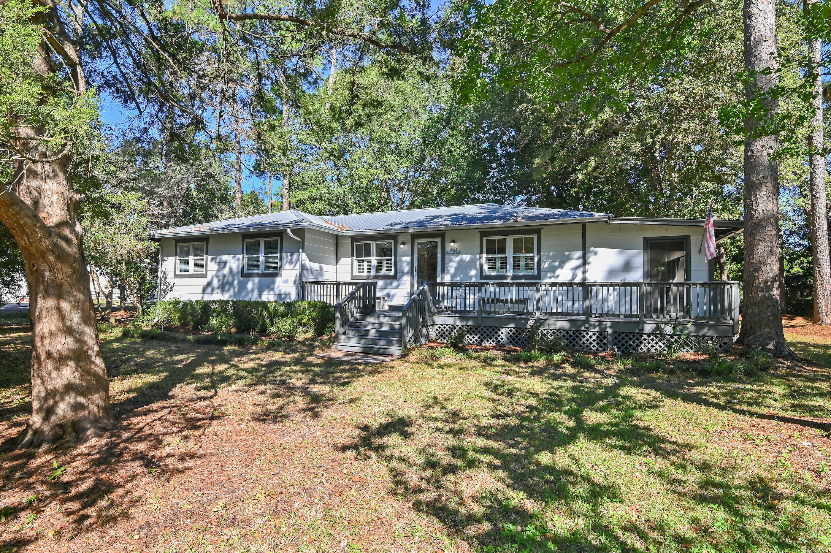 Located in the heart of Santa Rosa Beach, this charming Florida Cottage beautifully blends Old Florida character with modern updates. Situated among two lots, this 3-bedroom, 2-bathroom home is just minutes from the Cessna Landing boat ramp, local restaurants, public playgrounds, and more. Updated in 2022, this home offers an inviting open concept layout filled with natural light, ideal for full-time living or a coastal getaway. Surrounded by historic trees, the property features exceptional outdoor living spaces with two open porches and a spacious screened-in porch, perfect for relaxing or entertaining in the Florida sunshine.Enjoy all this prime location has to offer! Cessna Landing provides nearby access to the Choctawhatchee Bay for boating, paddle boarding, or fishing... while the nearby park includes an updated playground and picnic areas. Plus, the stunning Beaches of South Walton and everything you love about Scenic Hwy 30A are less than a 10-minute drive away, offering endless dining, shopping, and coastal adventures.