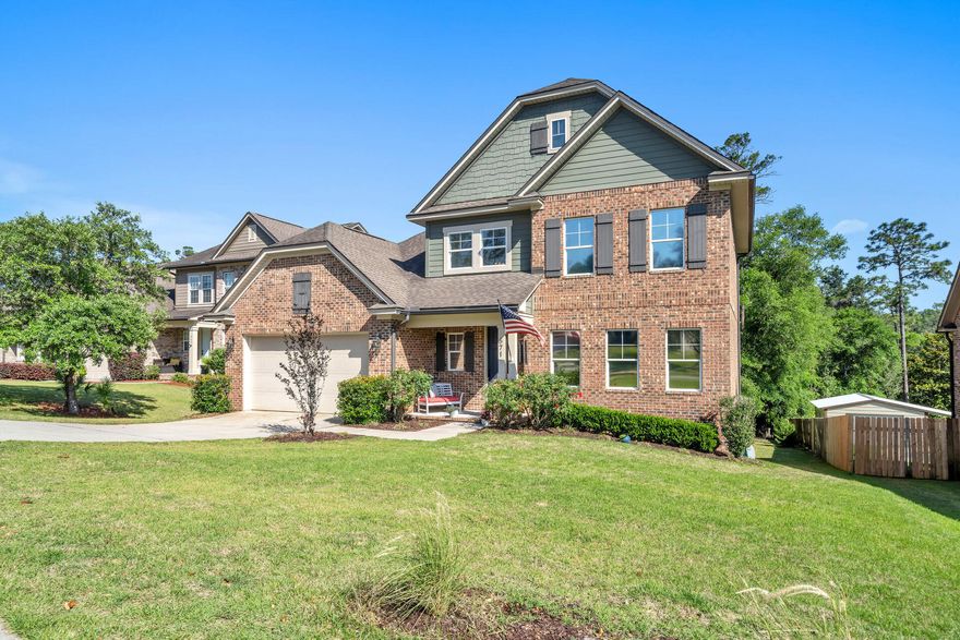 BETTER than new Randy Wise Home with a walk-out basement located on a .42 acre lot bordering a conservation area in the Hawks Landing community of Niceville. Hawks Landing is located at the North end of Turkey Creek Park and this home is just steps away from the park's picnic facilities and the Turkey Creek boardwalk and kayak launch area!  There is plenty of room for everyone in this thoughtfully designed floorplan. The main level features a great room open to a beautifully appointed kitchen with a center island, plenty of cabinets, granite counters and stainless appliances including a new dual-fuel stove/oven combination and a convection microwave. The deck adjacent to the kitchen is the perfect place for grilling and entertaining. The great room is flooded by natural light coming in