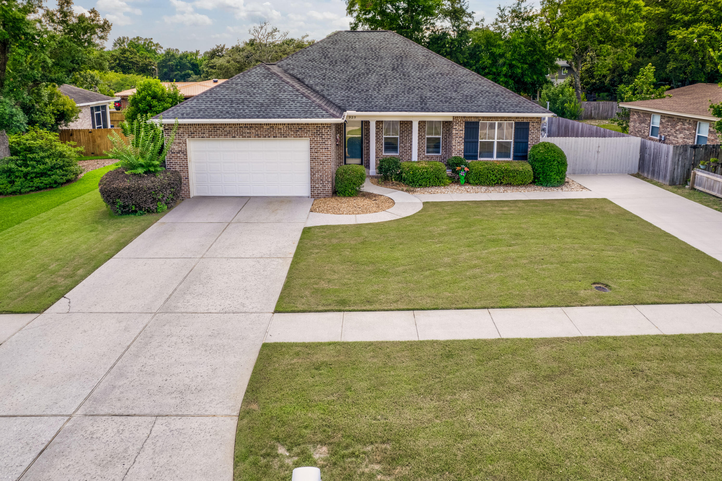 MUST SEE Huff-Built home in the Heart of Niceville! Welcome to this meticulously maintained luxurious Huff Custom-built 3 Bedrooms, 3 full-size Bathrooms home with your very own backyard Oasis featuring Blue Haven Gunite POOL, 8-foot privacy fencing, Boat / RV Owners Dream parking Plus a Bonus 4th detached unit. The allure of this property is further enhanced by its idyllic location in the heart of Niceville. The open floor plan is perfect for entertaining and features 10' ceilings throughout, designer hardwood flooring and recessed lighting. High-end Kitchen appliances are all stainless steel including new 2023 Samsung Refrigerator, granite counter tops, self-closing beautiful maple wood ample cabinetry, engineered luxurious hardwood floors. Master bedroom has his & her walk-in