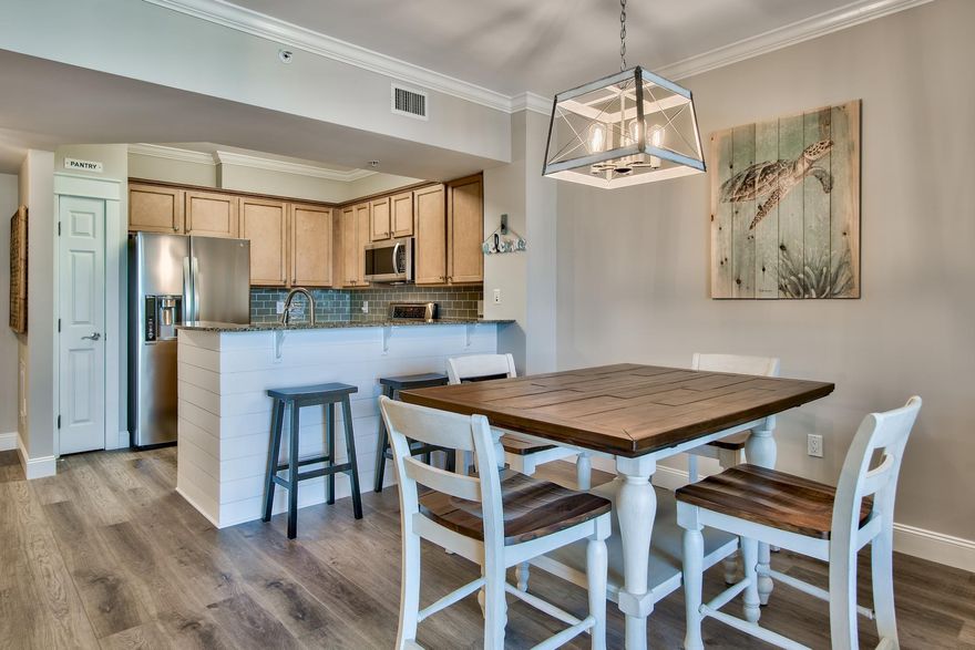 Gorgeous, turn-key unit at the highly desired Palms of Destin Resort and Conference Center. Lots of upgrades to the unit makes this a perfect home or investment. As soon as you enter the unit you'll notice the NEW Provenza long plank LVP flooring complete with Quietwalk underlayment, freshly painted interior, crown molding, 5 1/4 upgraded baseboards and door casings with pediment head trim!