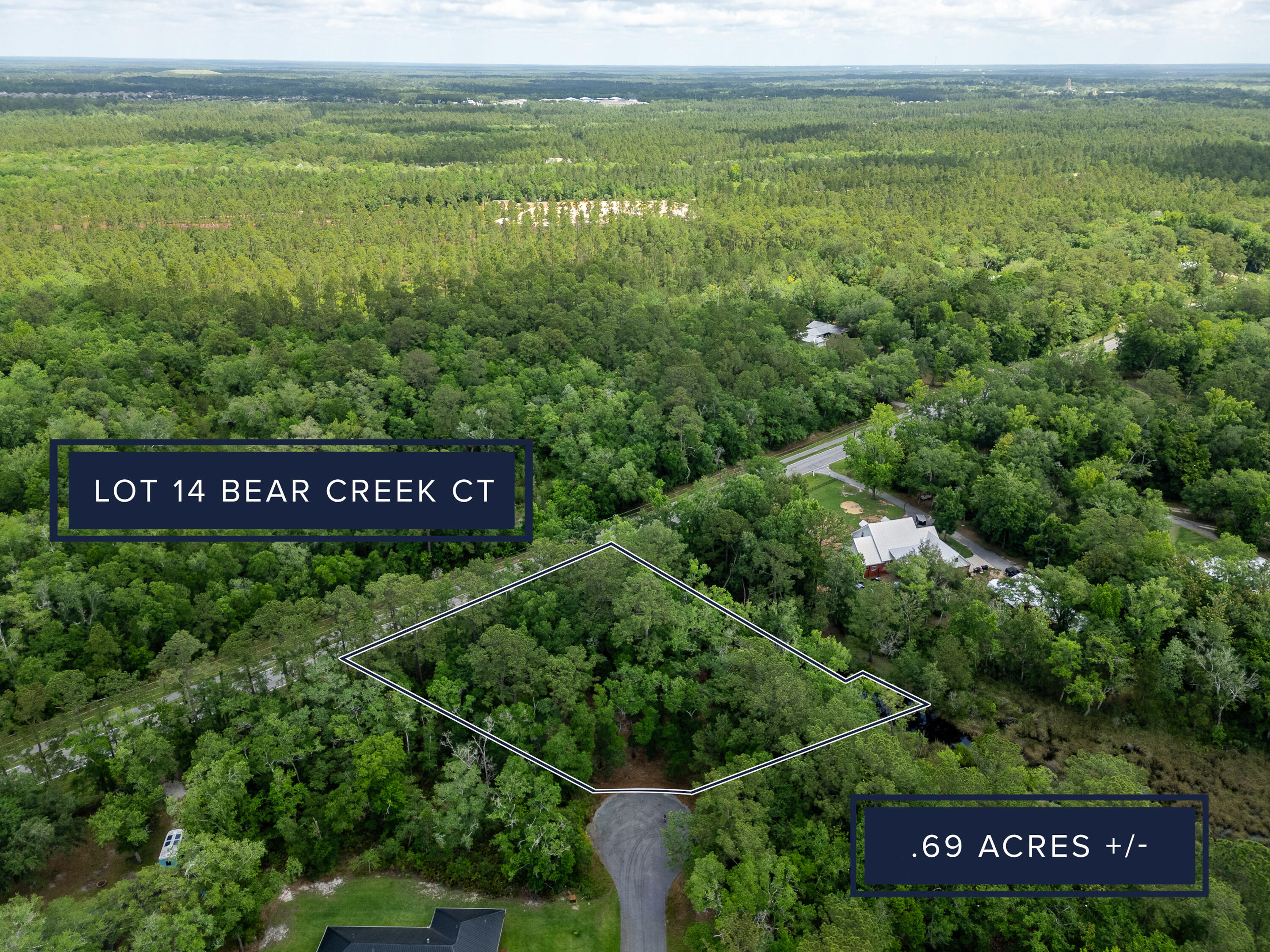 Discover the perfect canvas for your dream home on this spacious .69-acre lot in the serene Bear Creek Shores community of Freeport. Nestled in a peaceful cul-de-sac, this property offers the best of coastal living with direct water access to Choctawhatchee Bay, ideal for kayaking, paddleboarding, and embracing the waterfront lifestyle. Enjoy the freedom of no HOA, giving you the flexibility to design and build with little restrictions. Don't miss this rare opportunity to own a slice of paradise in a prime location, perfect for nature lovers and water enthusiasts alike!