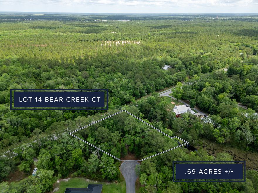 Discover the perfect canvas for your dream home on this spacious .69-acre lot in the serene Bear Creek Shores community of Freeport. Nestled in a peaceful cul-de-sac, this property offers the best of coastal living with direct water access to Choctawhatchee Bay, ideal for kayaking, paddleboarding, and embracing the waterfront lifestyle. Enjoy the freedom of no HOA, giving you the flexibility to design and build with little restrictions. Don't miss this rare opportunity to own a slice of paradise in a prime location, perfect for nature lovers and water enthusiasts alike!