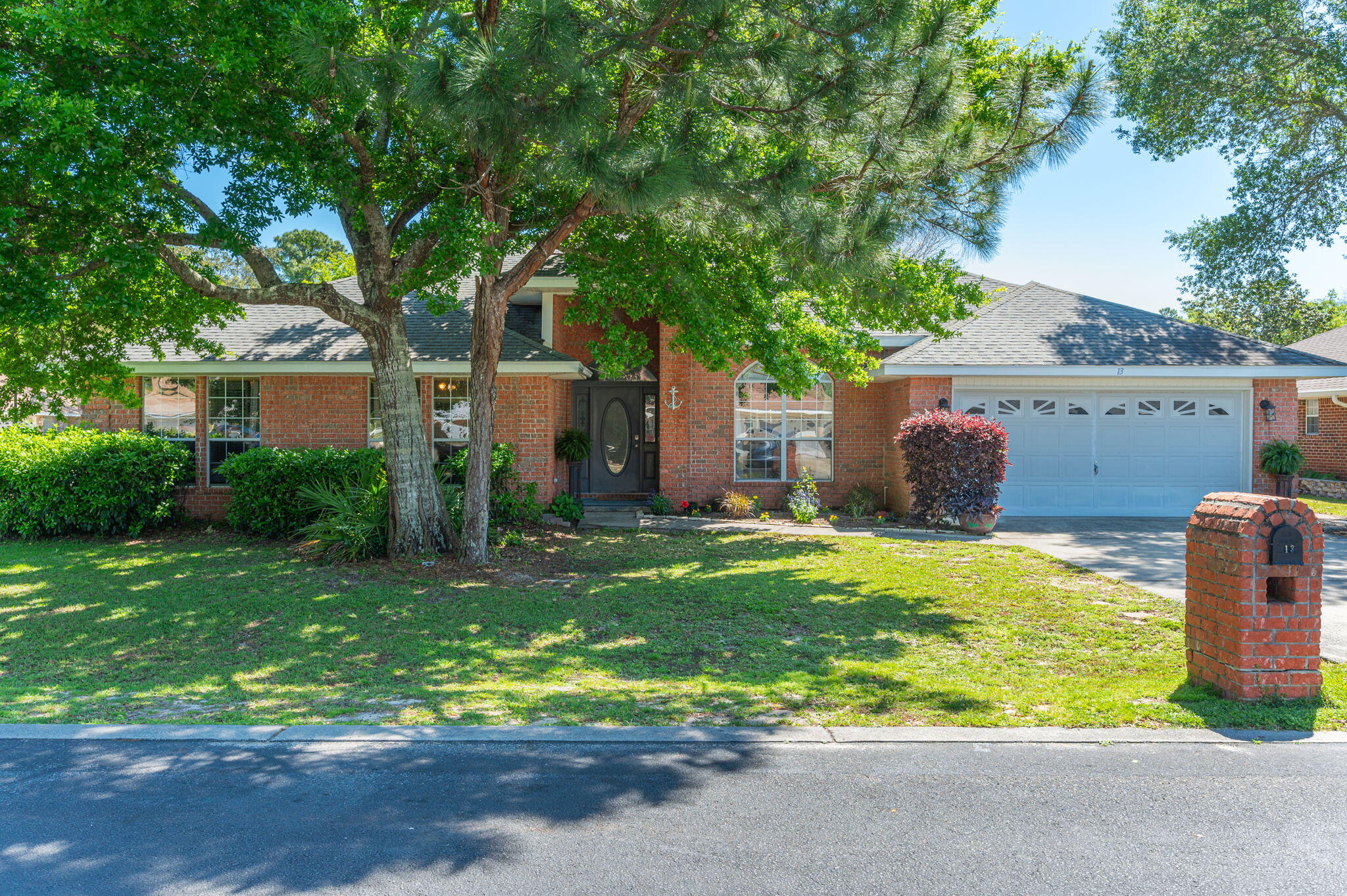 Massive corner lot home located in highly desired Mack Bayou Pointe.Remodeled and renovated, this home provides homeowners with modern upgrades, custom finishes, and all of the appurtenances the heart desires. Corner lots are the most desirable lots in Mack Bayou Pointe and this one is no exception providing access to a fenced in backyard where you can park a golf cart, bay boat, and your favorite family toys.This all brick home encompasses 3,200+/- heated/cooled square feet (2992 main house + 200 Florida Room) on a sprawling corner lot in a low-fee bayou side community with neighborhood pool. The exceptional corner lot is enhanced by mature shade trees which shield two of the four bedrooms; updated farmhouse-chic kitchen with custom butcher block countertops and custom backsplash. LVP flooring spans the main living areas with oversized tile in the bedrooms for ease-of-cleaning and durability.
A brand new custom tile shower was recently installed in the master bathroom.
A trey ceiling adorns the master bedroom and all bedrooms have either a newer fans or custom lighting.
Entertaining is an absolute pleasure in this home as the Florida rooms spans the back of the home and allows for ultimate privacy for friend and family gatherings.
Paver patio backyard, oversized open concept living space, custom tile primary bath, fireplace, screened porch and additional Florida Room.  Extraordinary positioning within 1 mile of Publix, Hospital, boutique shopping and dining, movie theater, tennis/golf and the famous Baytowne nightlife.

