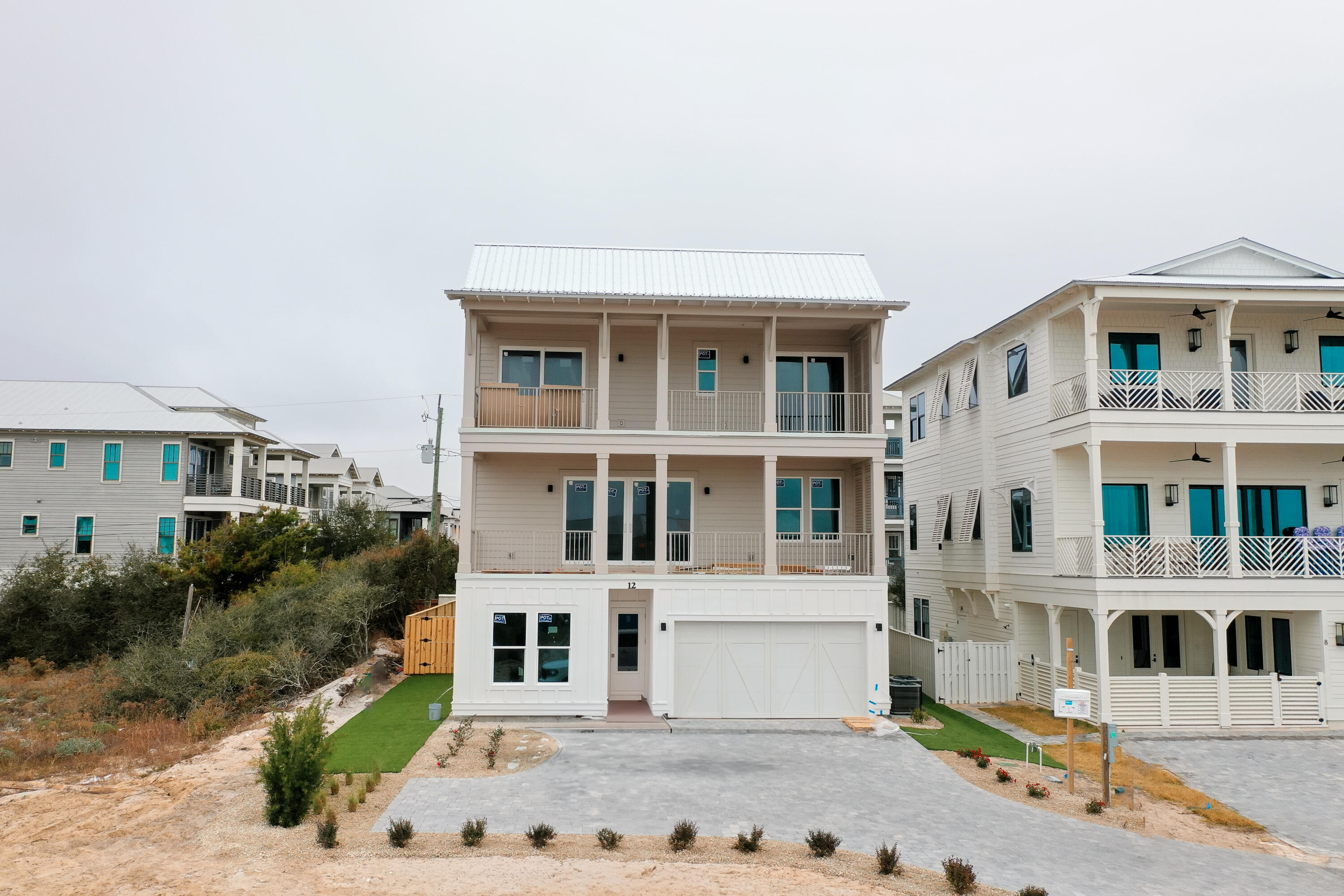 Discover the epitome of luxury coastal living at 12 Jan Court, a breathtaking home in the highly desirable Inlet Beach community. Designed with sophistication and comfort in mind, this property boasts six spacious bedrooms and six full bathrooms, making it the perfect retreat for families and guests alike.The 2nd-floor living area maximizes breathtaking Gulf views, creating a serene backdrop for gatherings or quiet moments alike. Expansive windows invite an abundance of natural light, seamlessly connecting the indoors with the beauty of the surrounding environment. The gourmet kitchen, equipped with premium appliances and refined finishes, makes hosting effortless, while the open-concept floor plan ensures every space feels connected. The first floor offers a cozy family room, ideal for gathering and relaxing after a day at the beach. Step outside to your private pool, a serene outdoor oasis perfect for cooling off, soaking up the sun, or hosting lively poolside gatherings. This additional living space ensures the home is as functional as it is beautiful, catering to every lifestyle.
Each bedroom is a private oasis with luxurious en-suite bathrooms that combine functionality with refined design. This home seamlessly blends coastal charm with modern elegance, offering style and comfort at every turn.
Located just steps from the Gulf's sugar-white sands and emerald waters, 12 Jan Court offers unparalleled access to the best of Inlet Beach. Whether enjoying the views from your private balcony or exploring the vibrant local scene, this property offers a lifestyle that is as relaxing as it is exhilarating.
