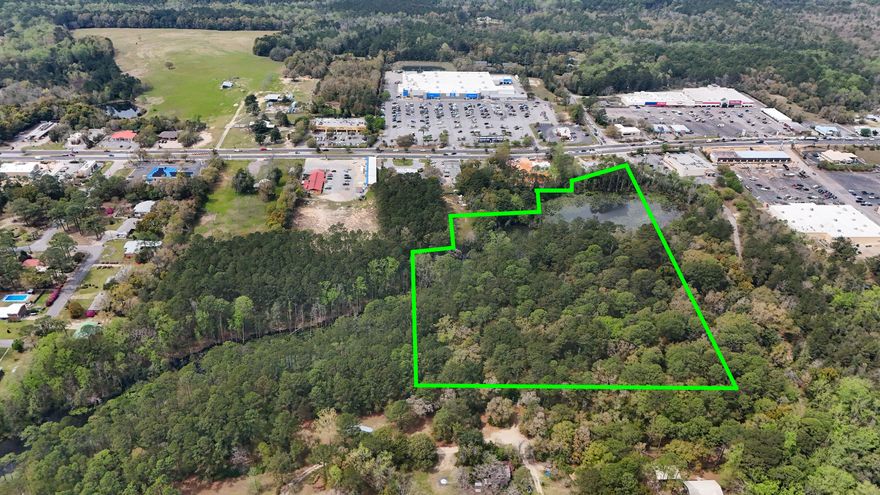 This exceptional 15 ACRE COMMERCIAL property, ZONED C2, is strategically located just off US HWY 331S, across from WALMART and less than 1 MILE NORTH OF I-10, in the rapidly growing area of DEFUNIAK SPRINGS, FL. With convenient traffic light access from Corbett Drive and clear visibility from 331, this property offers unparalleled potential for a variety of commercial ventures.Offering 15 ac +/- altogether, with approximately 10 ACRES UPLANDS (mostly level), plus additional natural features including a beaver pond and creek. C2 ZONING allows for diverse uses such as hotels/motels, apartments, retail stores, professional offices, banks, restaurants, auto dealerships and more. Easily seen from Hwy 331, the sellers have added an additional opportunity for a 331S MONUMENT SIGN. Flexible options include subdividing the property into 2, 3, or more parcels to suit your specific needs. Sellers are creative and willing to consider various, serious proposals. Whether you're looking to develop a single-use project or a mixed-use complex, this property can accommodate your vision. A completed HOTEL/MOTEL FEASIBILITY STUDY is available for review for serious buyers. With access to electric, city water and city sewer, this property is poised to be a project with the pieces of the puzzle needed for a straightforward start.

The natural features and layout of the property also provide numerous opportunities for landscaping and design. This is a rare opportunity to secure a prime piece of commercial real estate in a thriving market.