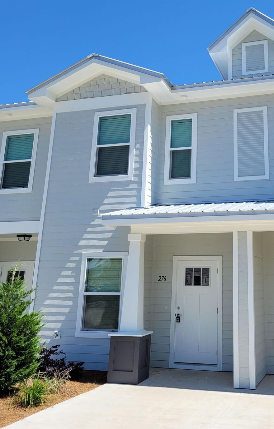 New townhouse in The Verandas at Freeport, one of the few new construction, upscale townhome developments in the lighter traffic area north of the bay and still within 20 minutes of the sandy white beaches of 30A. 3BR / 2.5 BA, 1336 sq.ft, open floor plan, including Quartz counter-tops throughout, Stainless Steel Appliances, and Luxury Vinyl Plank flooring. Window blinds and all appliances +PLUS+ NEW WASHER AND DRYER ALL INCLUDED IN SALE. Back patio can remain open-air but is approved for screened-in option. INVESTORS: Current average rental in The Verandas is over $2,000/monthly! (All units are 3BR/2.5BTH)