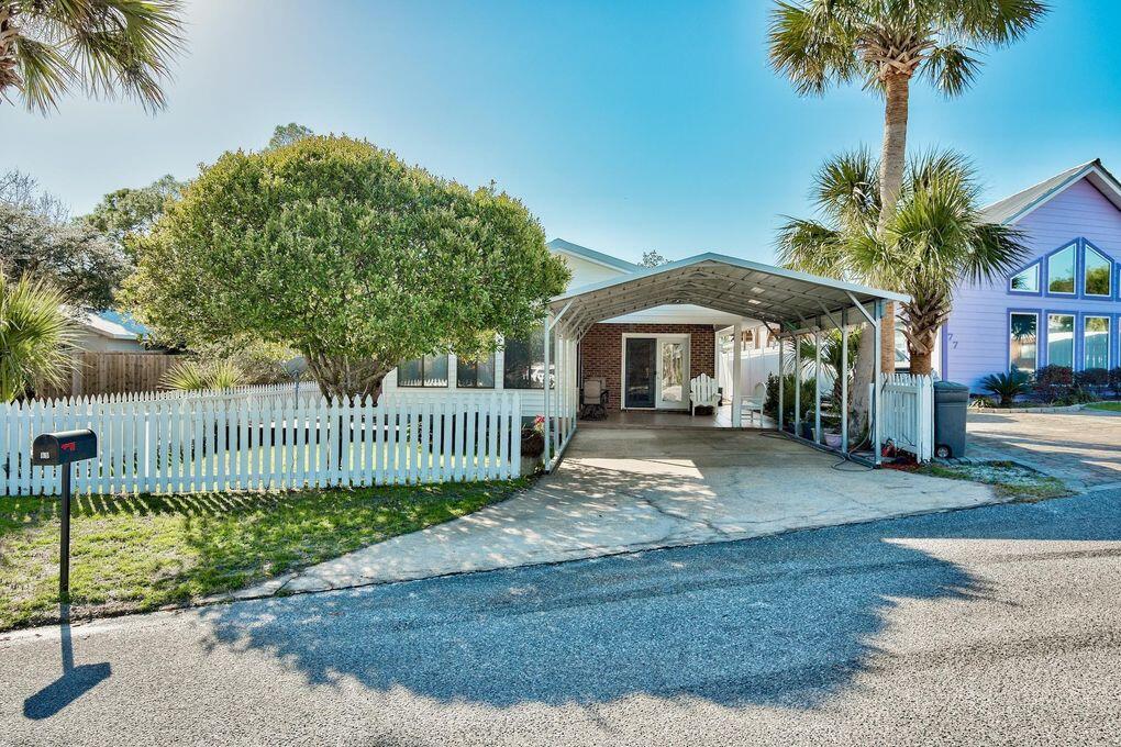 Florida beach cottage located in the heart of Blue Mountain Beach in desirable Blue Gulf Resort, just a 1/2 mile to the beach & emerald green waters of the Gulf of Mexico! This home is a solid brick home with updated metal roof & carport. This is a prime investment for full time living, second home or rental.