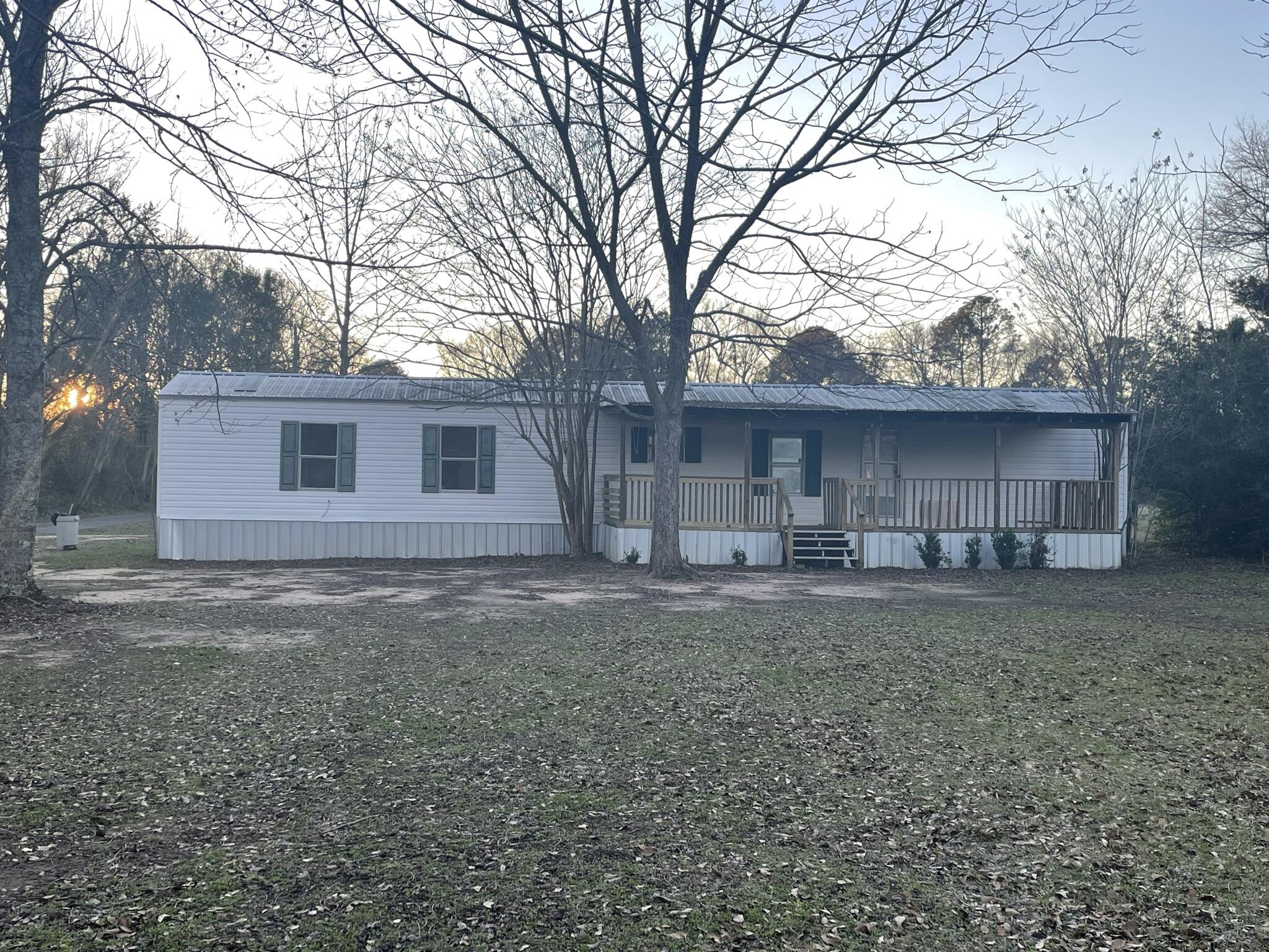 Great investment opportunity on this affordable 2 bedroom 2 full bath mobile home, situated on 1.48 acres in Baker. Move in ready with fresh paint through out. Large 31 foot wide front porch.