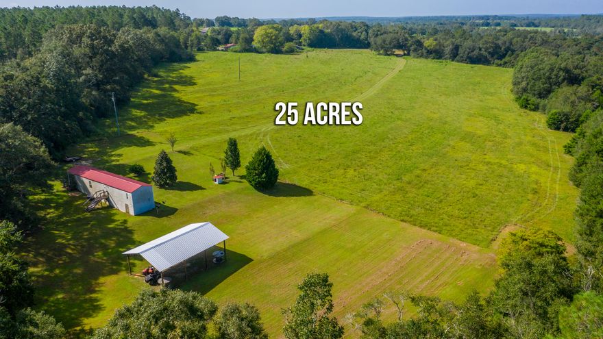 Welcome to paradise! This well cared for 2 bedroom, 2 full bathroom home is located on a beautiful 25 acres. 16 acres are cleared, completely fenced and ready for your animals while 9 acres are still wooded, full of gorgeous hardwoods and perfect for hunting. The creek that runs along the West side of the property has beautiful clear, cool water flowing through it year round, perfect for this Florida heat. The HVAC was replaced in 2020 and the metal roof and well were replaced in 2013. Laminate floors were added to the kitchen, living room and hallway in 2018. Perfect for all of your toys is a 24' x 36' pole barn with electricity which was built in 2018. Don't miss out on this great property!