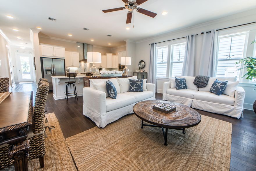 One of the closest homes in the community to the beach via the new bike trail located directly behind the home! Stunning cottage located in the prestigious subdivision of Highland Parks of Blue Mountain Beach, featuring a resort-style community pool, collections of covered and uncovered seating areas, an extraordinary chef's kitchen, outdoor TV, pool waterfalls, a hot tub, and a fire pit! Entering the home, you will be welcomed by a tastefully decorated, FULLY TURNKEY, open floor plan with hardwood floors throughout the home! The master bedroom sits on the main floor with the 2 guest bedrooms located on the second level. With a gross rental history of 45k in 2019, this home checks every box whether you're planning to use the home as a vacation rental or looking to live here full time!