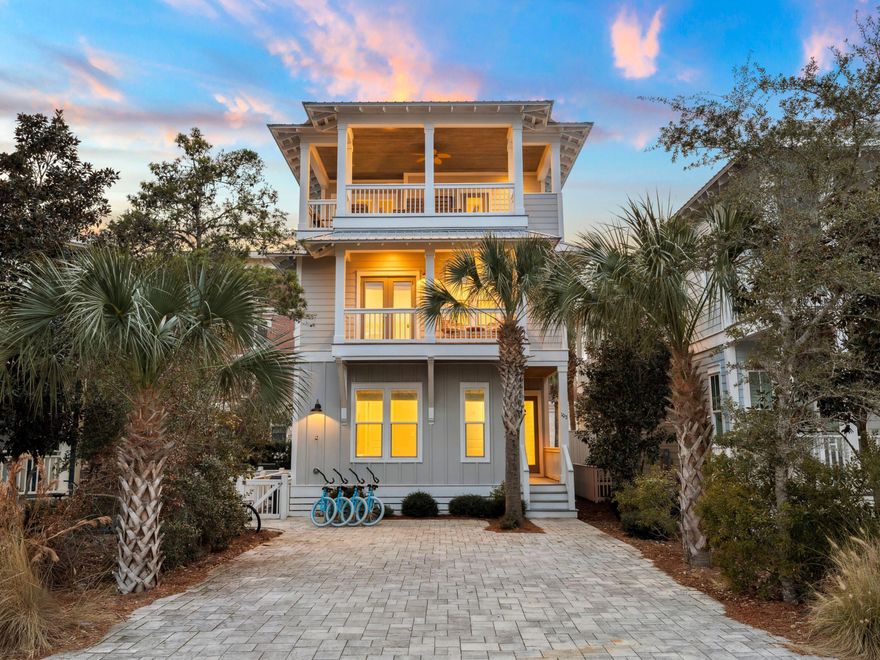 Perfectly positioned in the heart of Seacrest Beach, 102 Flip Flop Lane delivers the ultimate 30A lifestyle with private outdoor living, multiple entertaining spaces, and effortless access to the area's most iconic destinations. Nestled between Alys Beach and Rosemary Beach, this custom-built coastal home pairs elevated design with resort-style amenities, including a large private heated pool, an outdoor kitchen, and access to Seacrest's renowned 12,000-square-foot lagoon pool. Thoughtfully designed across three levels, the home offers five bedrooms, five-and-a-half baths, and more than 2,600 square feet of beautifully finished living space. Interiors feature gorgeous hardwood floors, high-end fixtures, and a light, coastal aesthetic that feels polished yet comfortable. The main living area flows seamlessly into the chef's kitchen, featuring stainless appliances, generous prep space, and an easy connection to the outdoor living areas  ideal for hosting a crowd or enjoying quiet mornings by the pool.

The layout offers exceptional flexibility, including two spacious primary suites with private ensuite baths, multiple guest suites, and a dedicated bunk room. A standout feature of the home is the third-floor rooftop entertaining deck, complete with a built-in kitchen, grill, and bar, perfect for sunset dinners, game-day gatherings, or evening cocktails under the stars.

With a private deeded beach access, a neighborhood tram stop nearby, and proximity to dining, shopping, and entertainment at Seacrest's town center, this is a rare opportunity to own a fully realized beach retreat designed for both unforgettable stays and effortless everyday living along 30A.