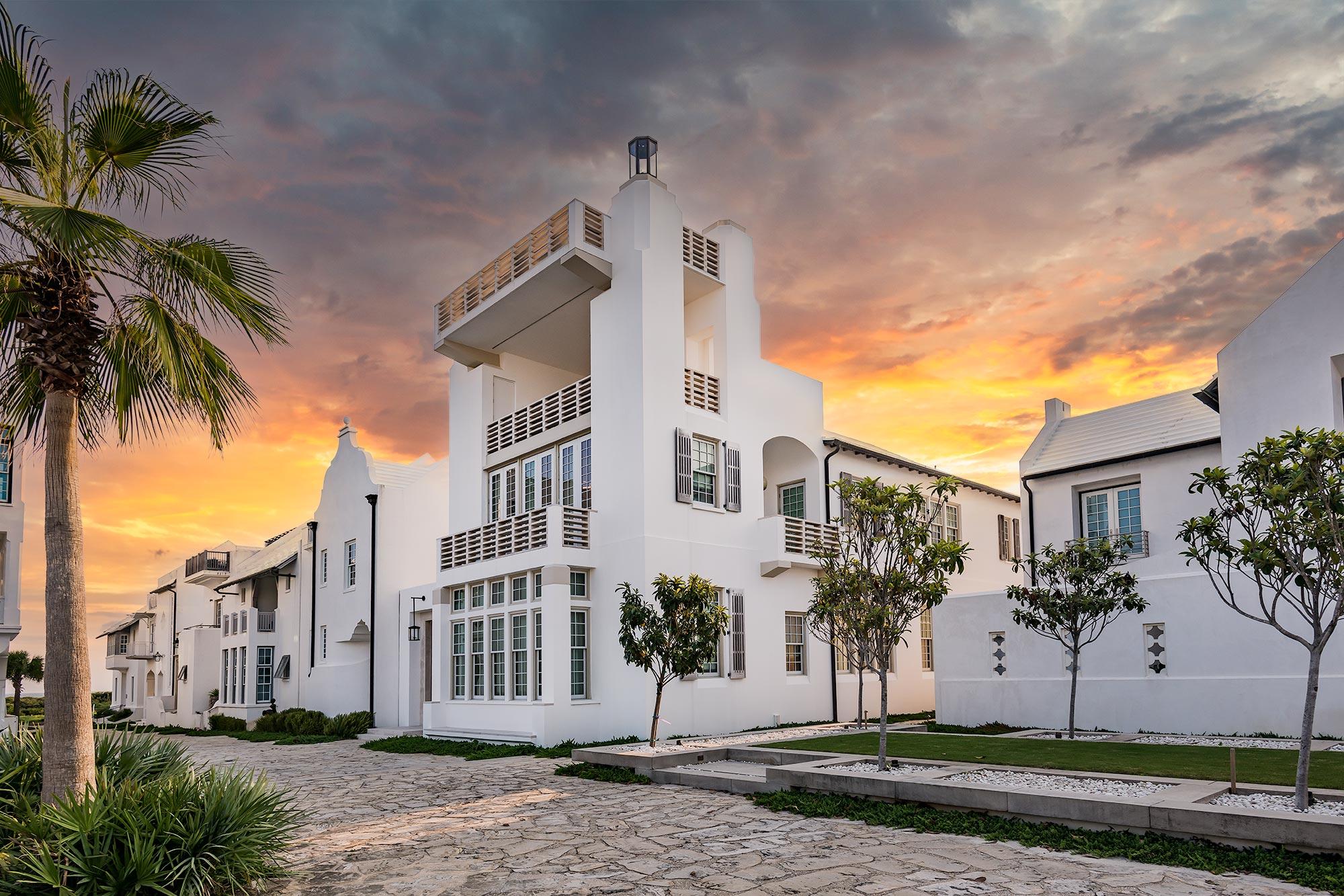 A gathering place by the sea shared freely with friends and affectionately named Casa Floridoro after the chivalric poem. This magically designed home by Khoury Vogt Architects, the firm led by Alys Beach Town Architects Marieanne Khoury-Vogt and Erik Vogt were given simple instructions...make this your greatest design. Water & Fire strategically orchestrate the elements found in Casa Floridoro. Top to bottom, water & fire the theme. Just one-and-a-half blocks from the Gulf, the home anchors a prominent axis at the south end of a grassy park known as The Parterre alongside Sea Garden Walk leading to the Gulf of Mexico. Overlooking the park, intricate details effortlessly flow on every floor and in every fixture, finish, and furnishing of the four story, four-bedroom home. The water and