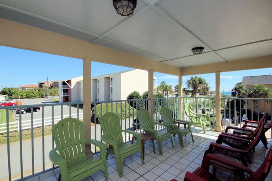 Awesome gulf views!!!Caribbean Manor ''Dominica'' located in the beach community of ''Port of Call'' Where else can you find a home of this caliber with 4 bedrooms upstairs with their own bathrooms? Just three houses down from the beautiful white sands and gorgeous emerald waters of the Gulf of Mexico? Also, this home is just across the street from the state park. This home exhibits unsurpassed quality and craftsmanship with updates such as granite counter tops, new cabinet, all new GE appliances, and hardwood floors. Don't let this one pass you by. Tremendous rental opportunity.