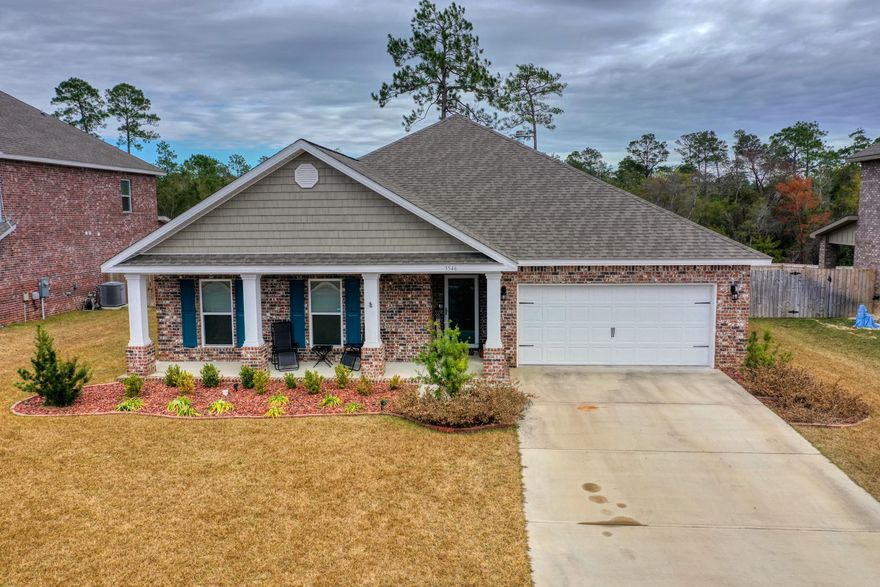 Remarkable home in an even better neighborhood! This 4 Bedroom, 3 bathroom home has covered front and back porches. It feels very spacious even before noticing the tray ceilings in the master suite and family room (double tray) accented with crown molding.  The master bathroom boasts a separate water closet and expansive walk in closet. The family room has a wood burning fire place and mantle to hang your stockings. From the family room the open concept floor plan welcomes you into the kitchen adorned with granite countertops, white cabinets, a walk in pantry and an island breakfast bar with extra seating. You can enjoy your morning coffee from the kitchen or from the covered back porch and welcome the nature in as the property line extends roughly 200 feet beyond where the trees begin.