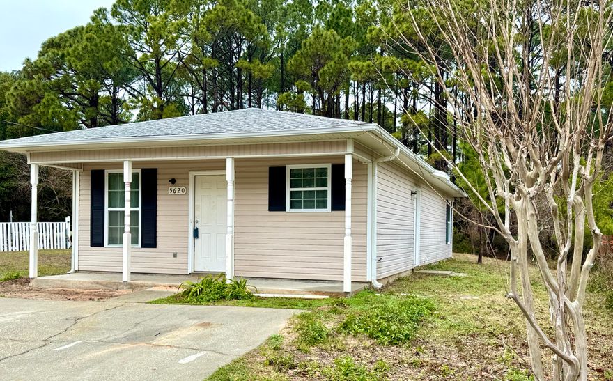 ALERT! THIS IS THE LOWEST PRICED SINGLE FAMILY HOME IN NAVARRE/GULF BREEZE! THIS QUAINT 2009 HOME IS PERFECT FOR A STARTER HOME / INVESTMENT BUYER. Upon entry you are greeted by a cozy living space w/ceiling fan & sunny windows that opens to a lengthy kitchen space w/cabinets running down the entire wall for ample storage. A window sink brightens the space. Plenty of room for a Lg kitchen island too! BRs are ample size w/swing closet doors. Single bath is spacious w/tub/shower combo & single sink cabinet. Ample room for a future bath remodel..a double vanity & ''future'' tiled tub/shower surround. Dream away! A Lg washer/dryer closet, side door & exterior attached storage closet completes the home. NO HOA. This home only needs some update touches! This is a gem at a great value!